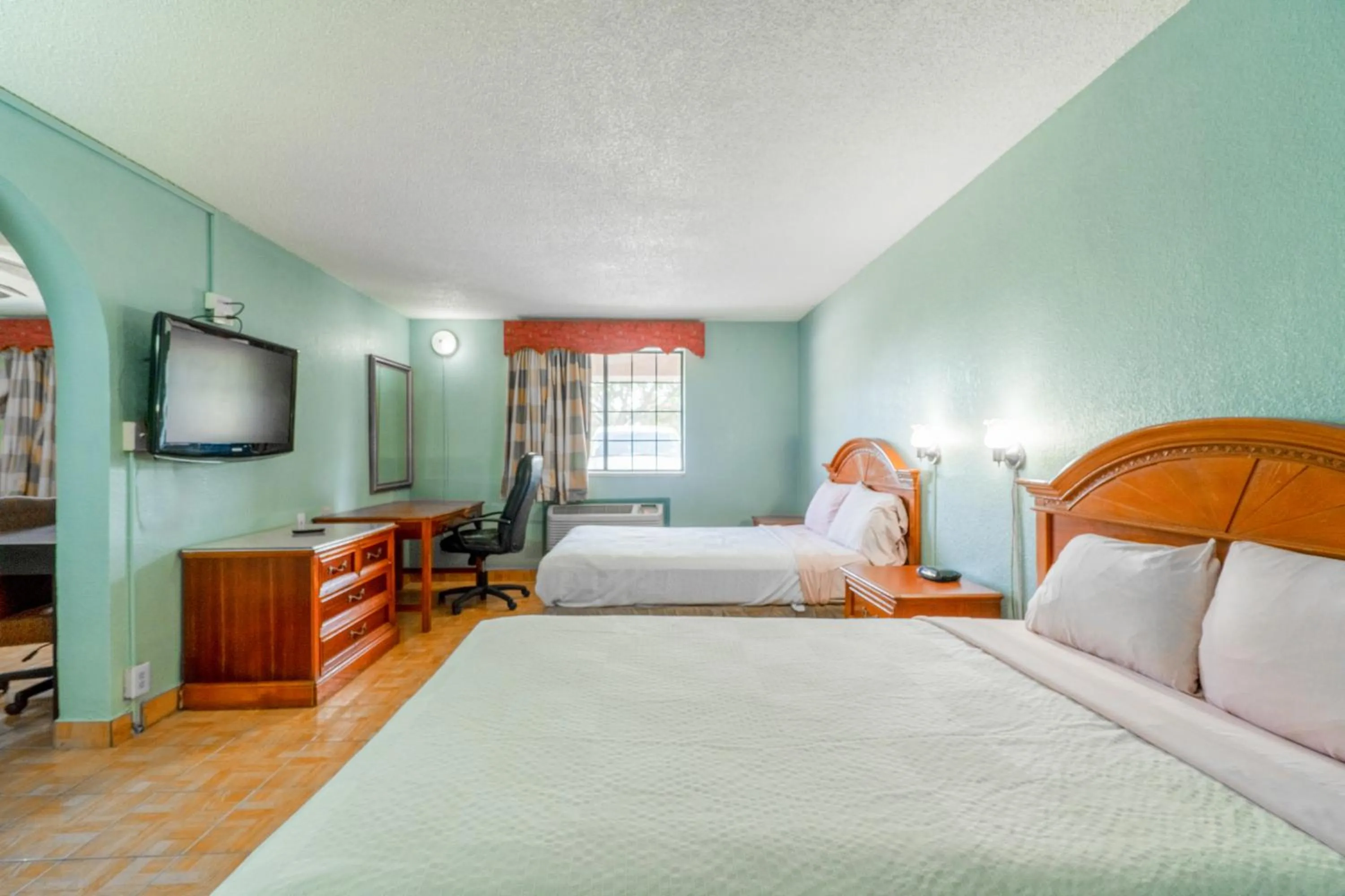 Bedroom, Bed in Lone Star Inn & Suites by OYO Harlingen TX