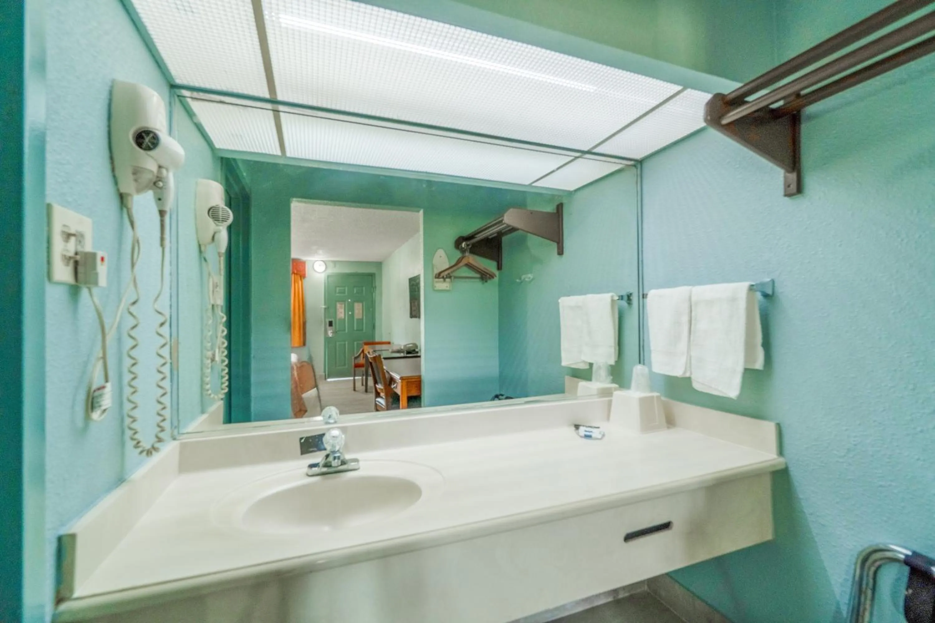 Bathroom in Lone Star Inn & Suites by OYO Harlingen TX