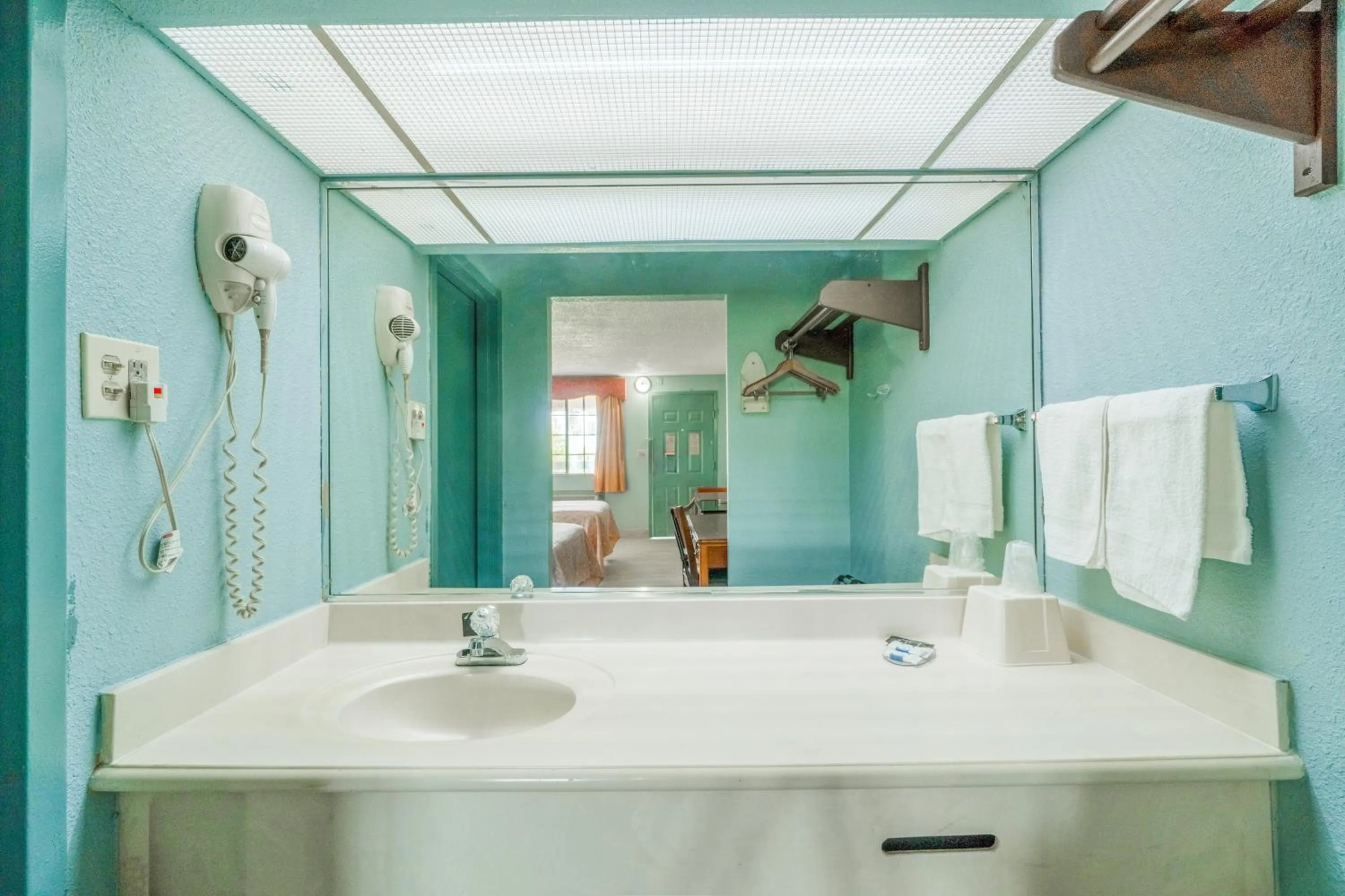 Bathroom in Lone Star Inn & Suites by OYO Harlingen TX