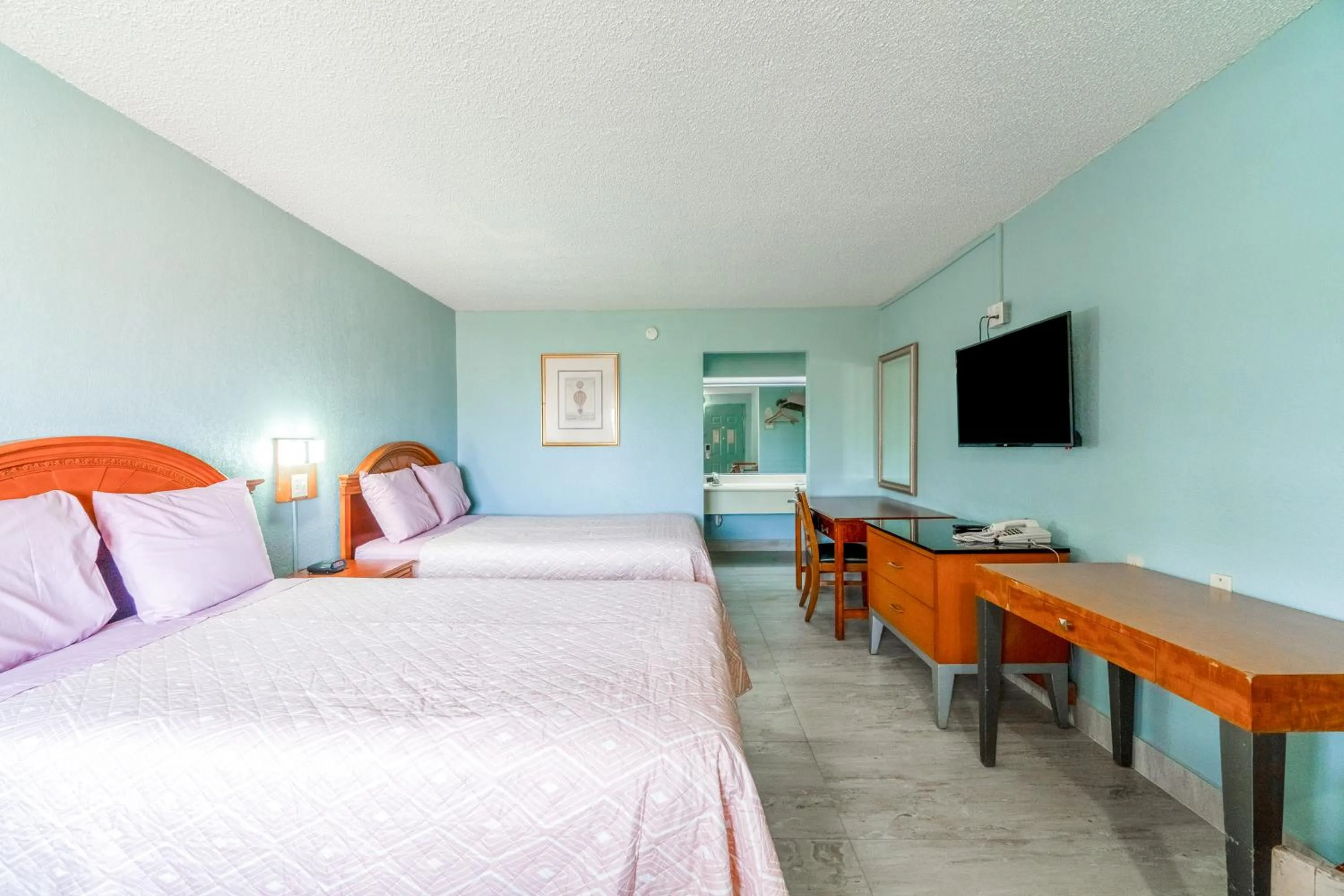 Bedroom, Bed in Lone Star Inn & Suites by OYO Harlingen TX