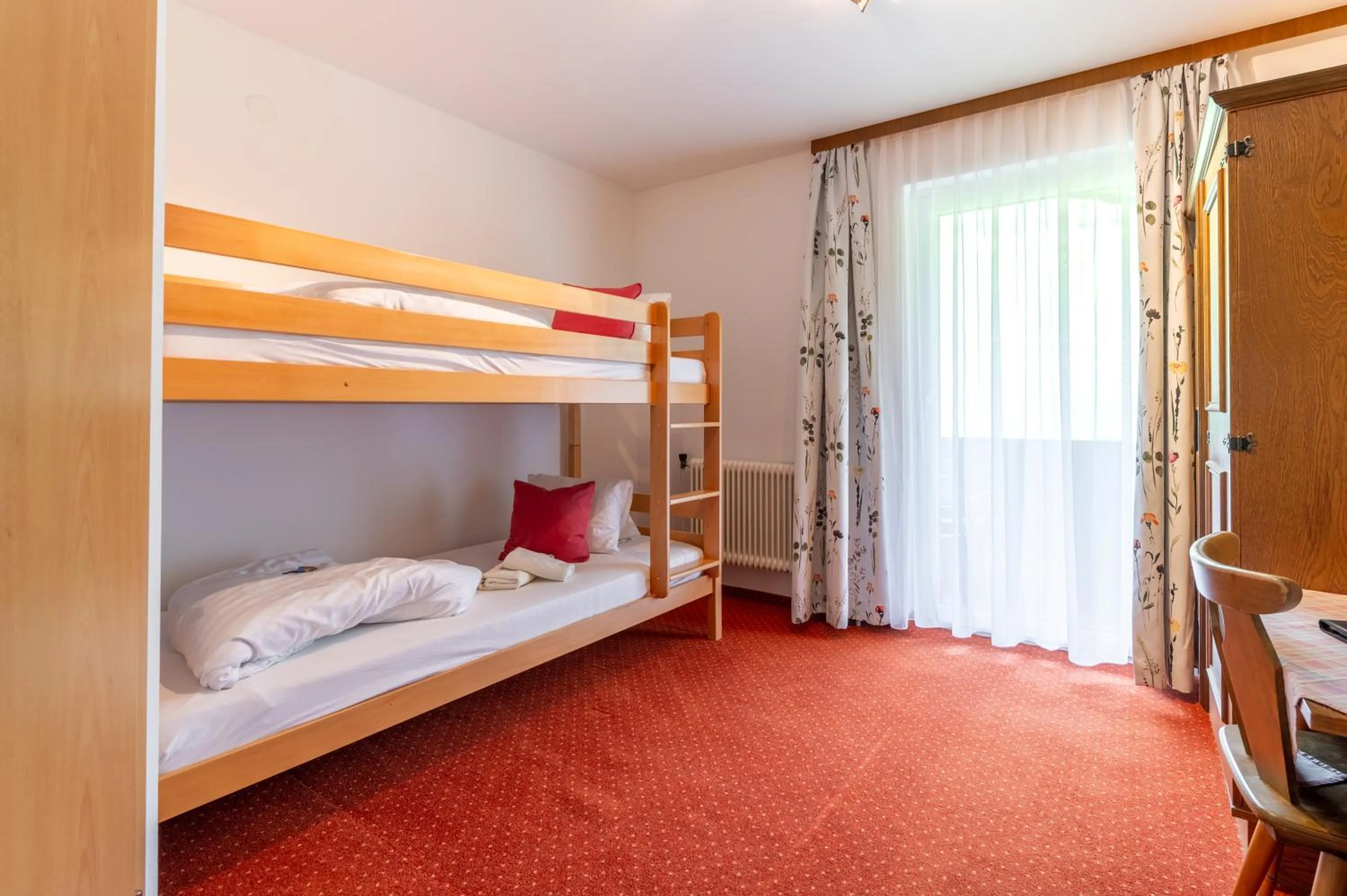 Bed in Panoramahotel Stocker