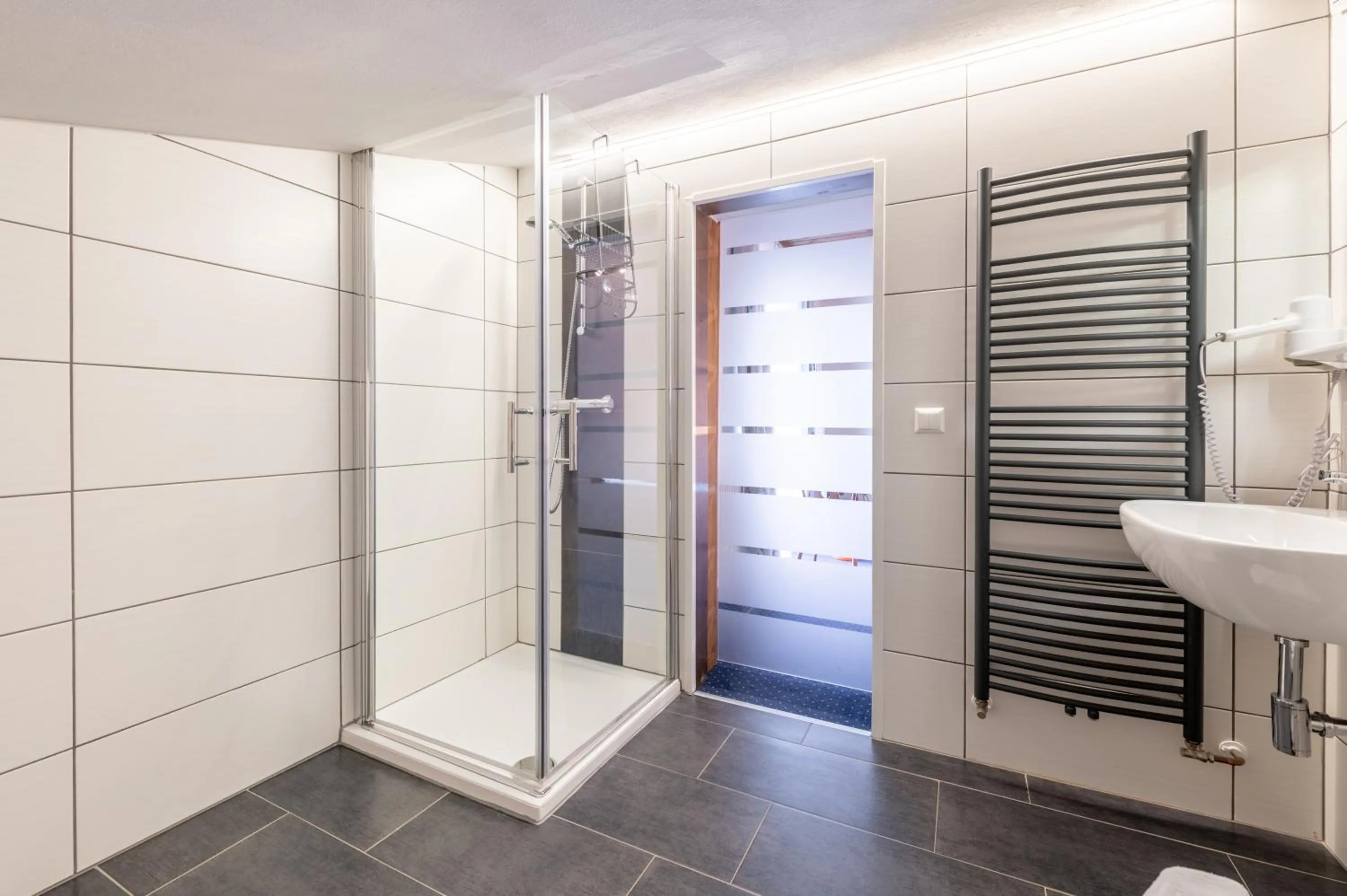 Bathroom in Panoramahotel Stocker