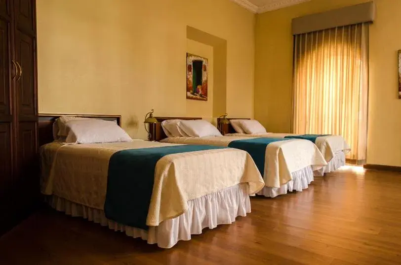 Photo of the whole room, Bed in Hotel La Casona Photo of the whole room, Bed in Hotel La Casona