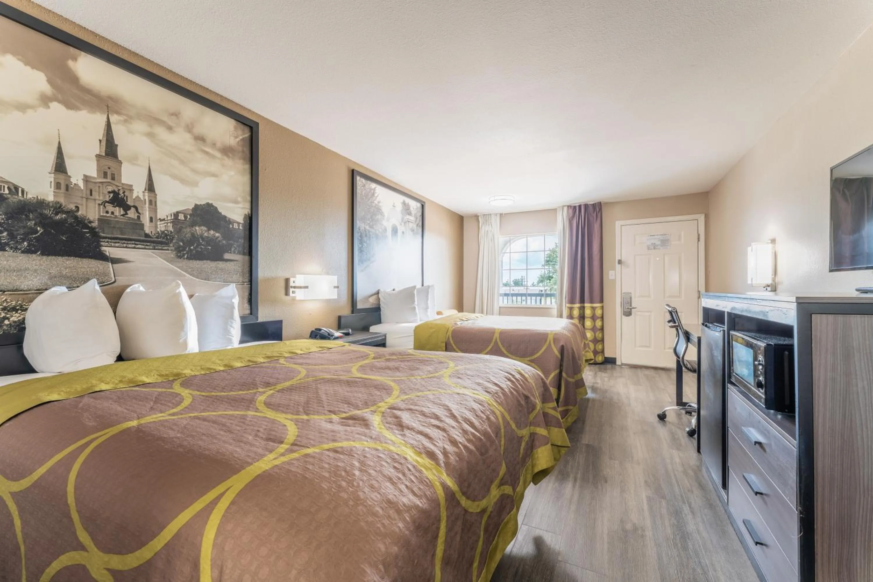 Bed in Super 8 by Wyndham Lake Charles Northeast