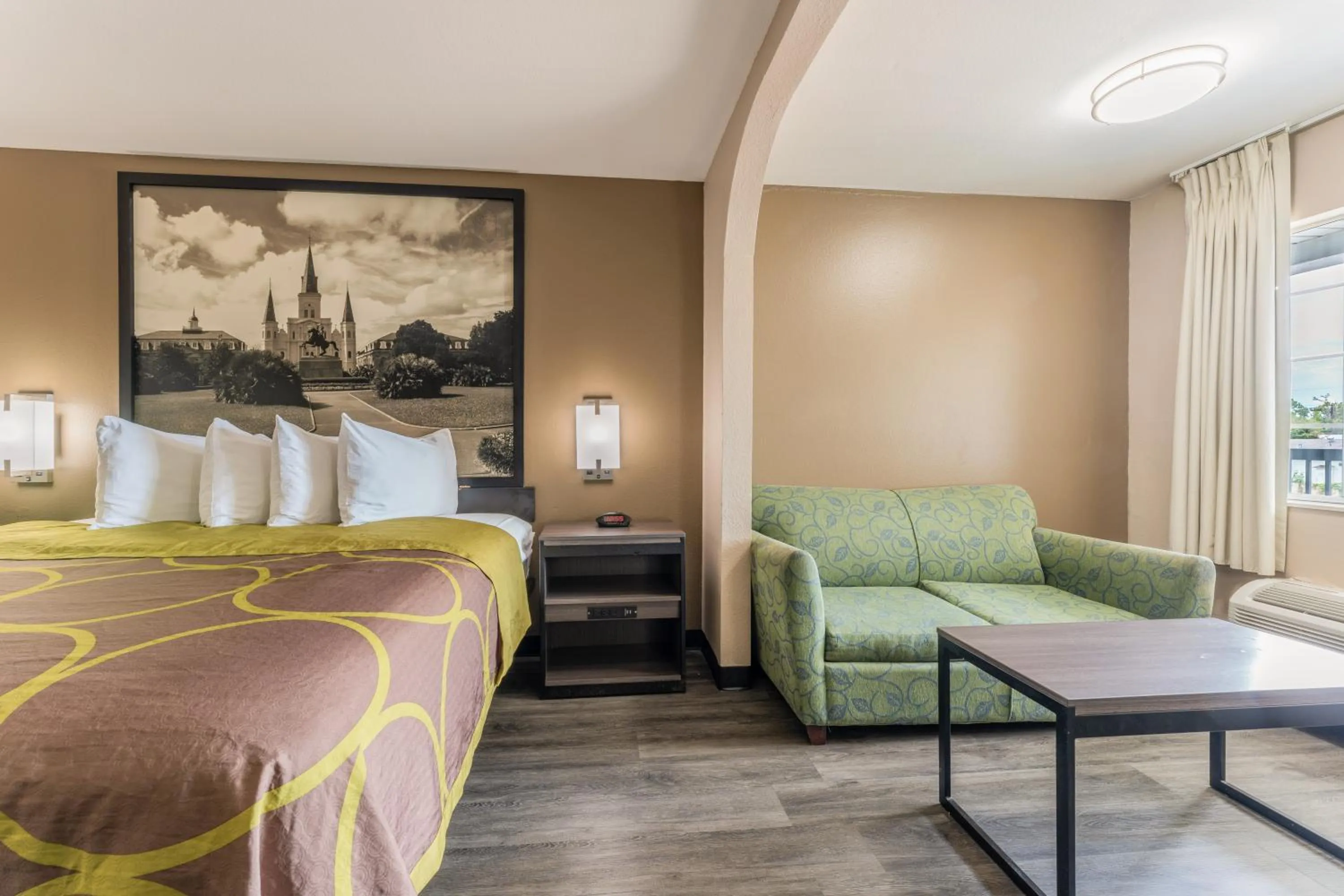 Living room, Bed in Super 8 by Wyndham Lake Charles Northeast