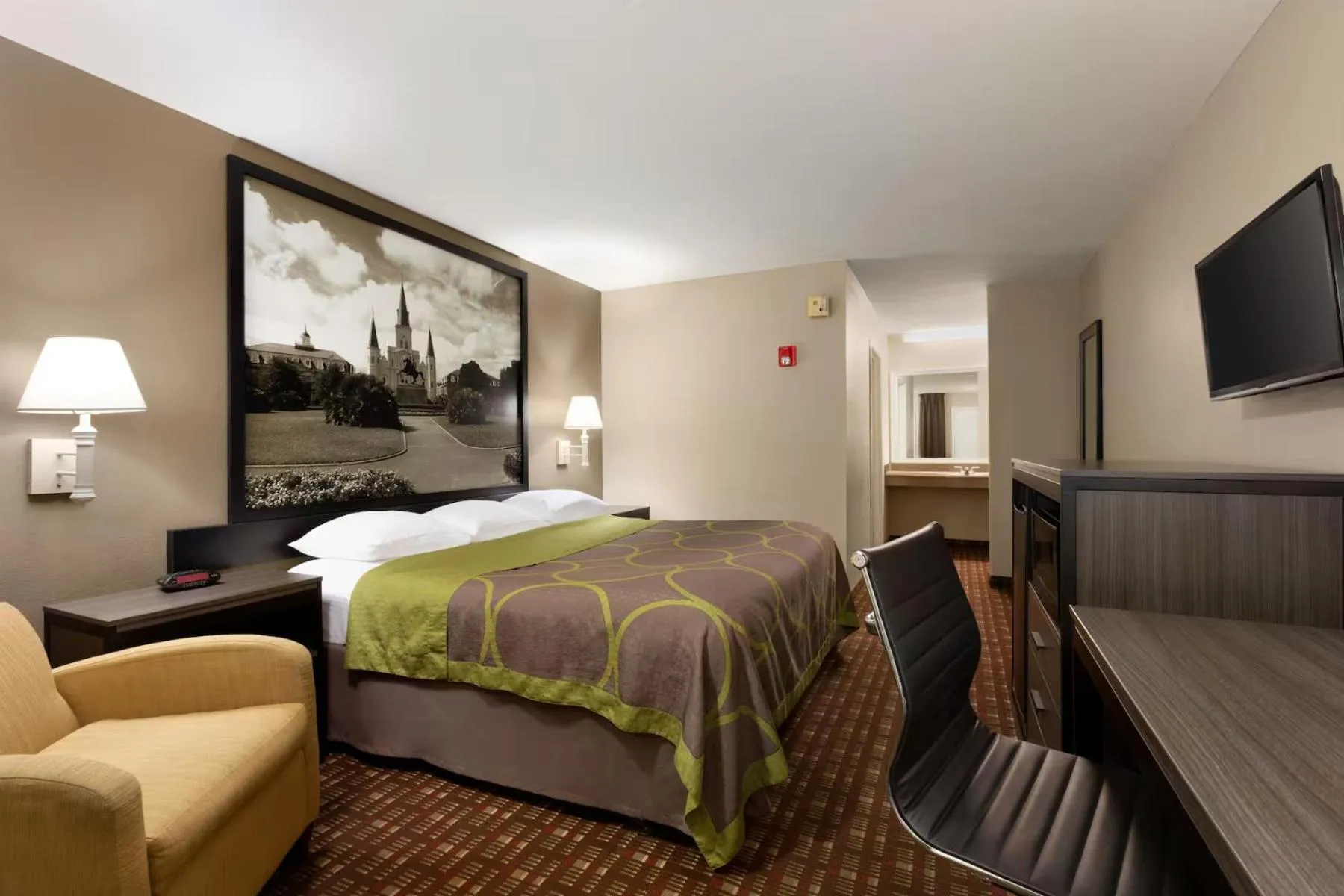 Bed in Super 8 by Wyndham Lake Charles Northeast