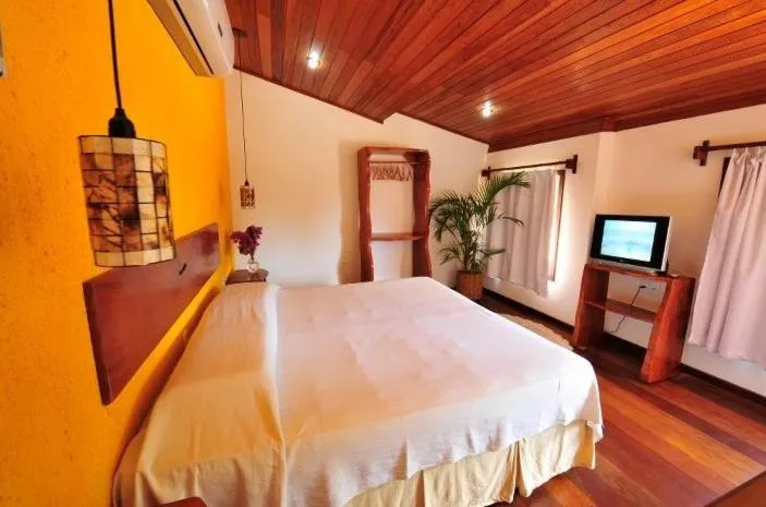 Photo of the whole room, Bed in Pousada Funny