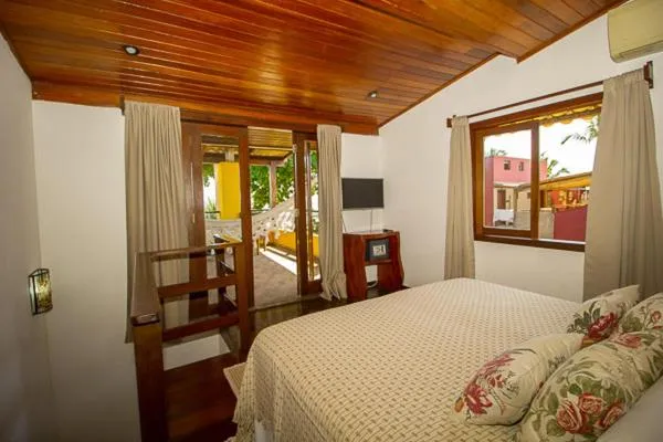 Bed in Pousada Funny