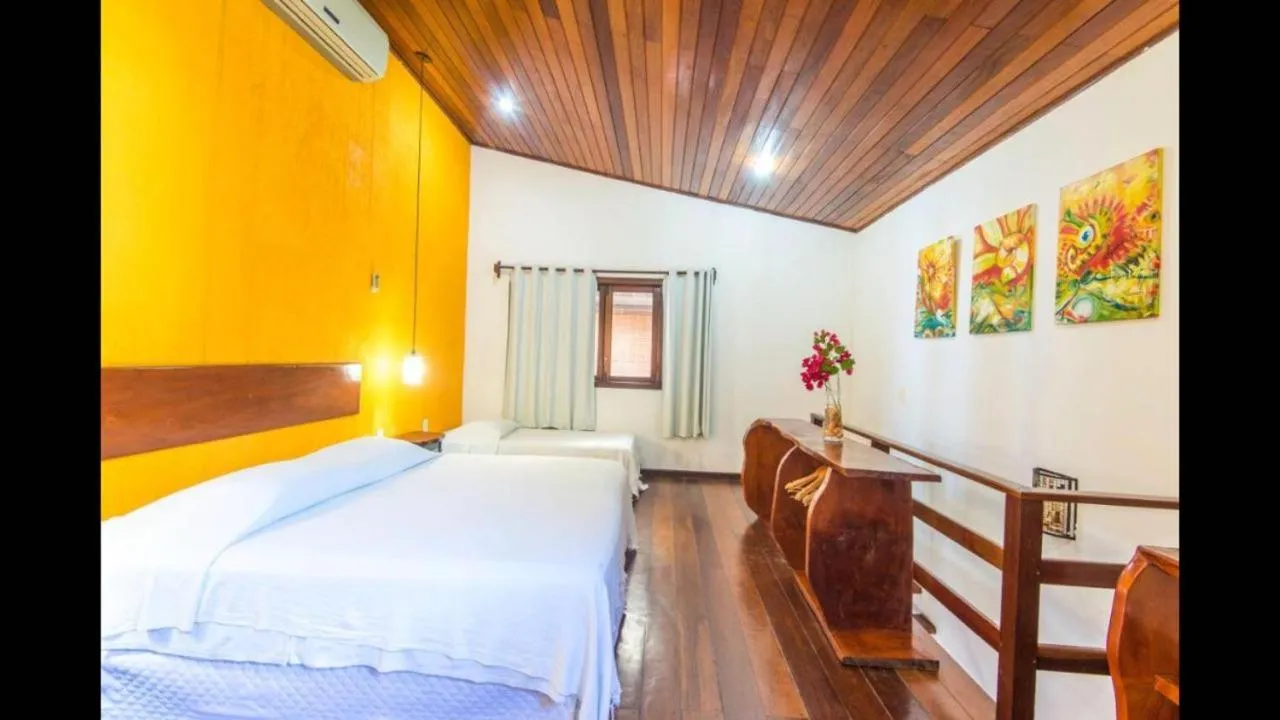 Bed in Pousada Funny