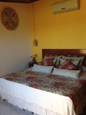 Bed in Pousada Funny