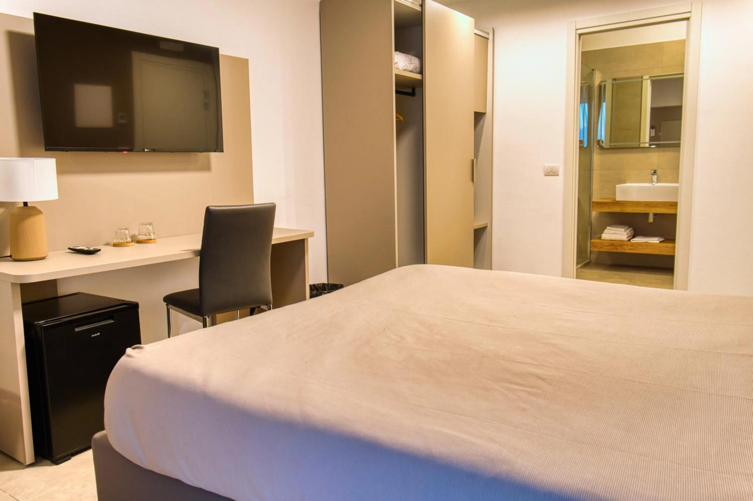 Bed in Moma Hotel Wellness & Spa