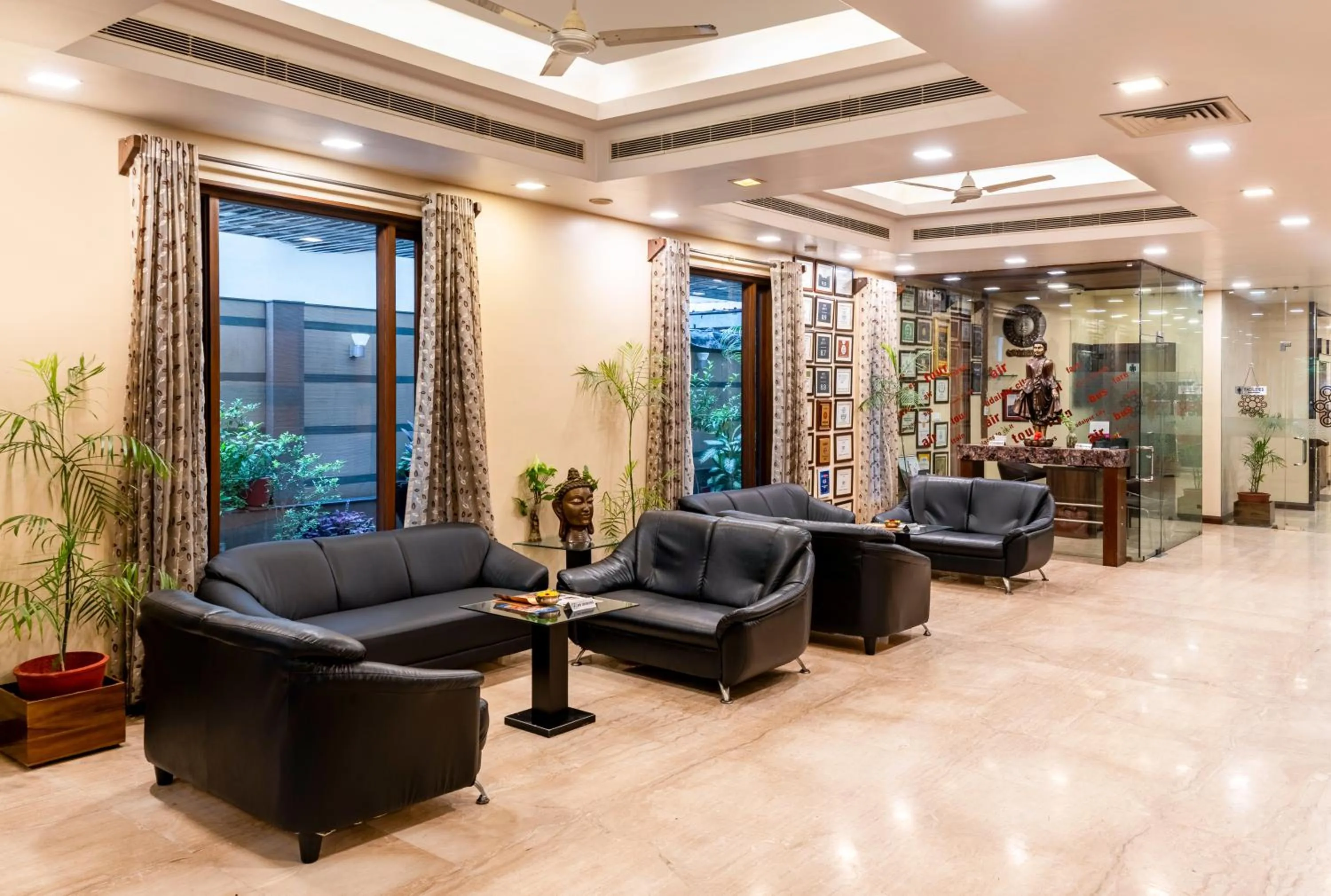 Lobby or reception in Amantra Comfort Hotel