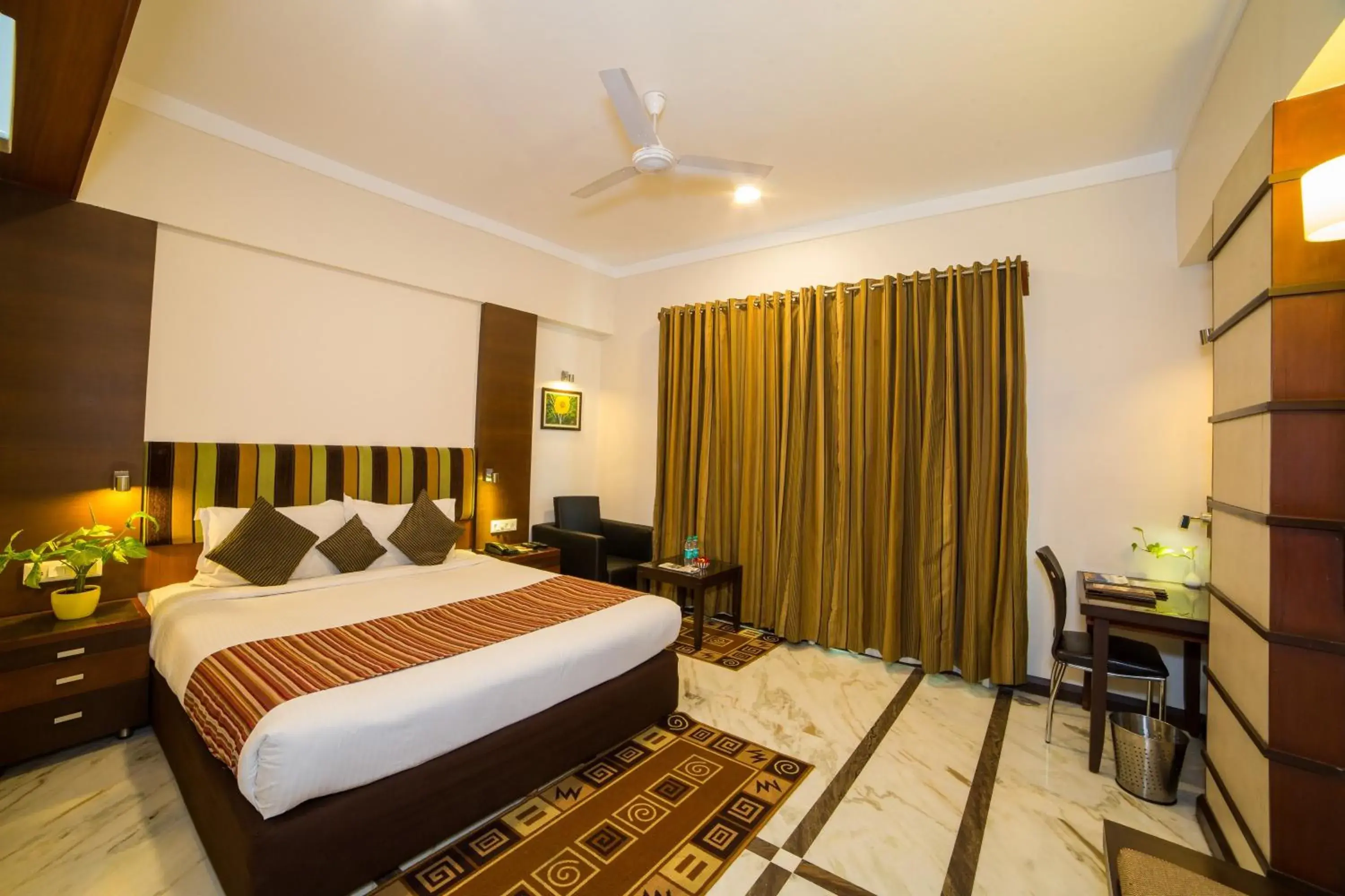 Bed in Amantra Comfort Hotel Bed in Amantra Comfort Hotel