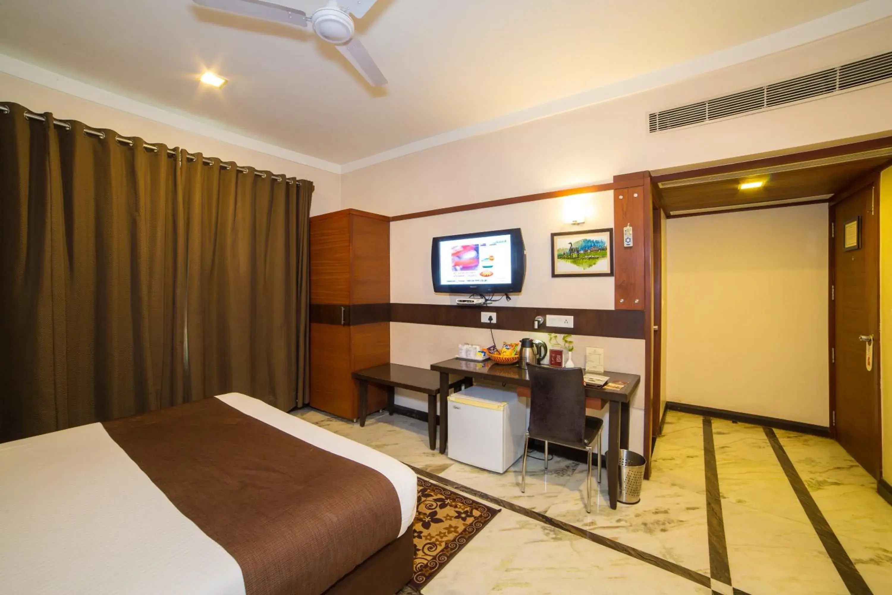 View (from property/room), Bed in Amantra Comfort Hotel View (from property/room), Bed in Amantra Comfort Hotel