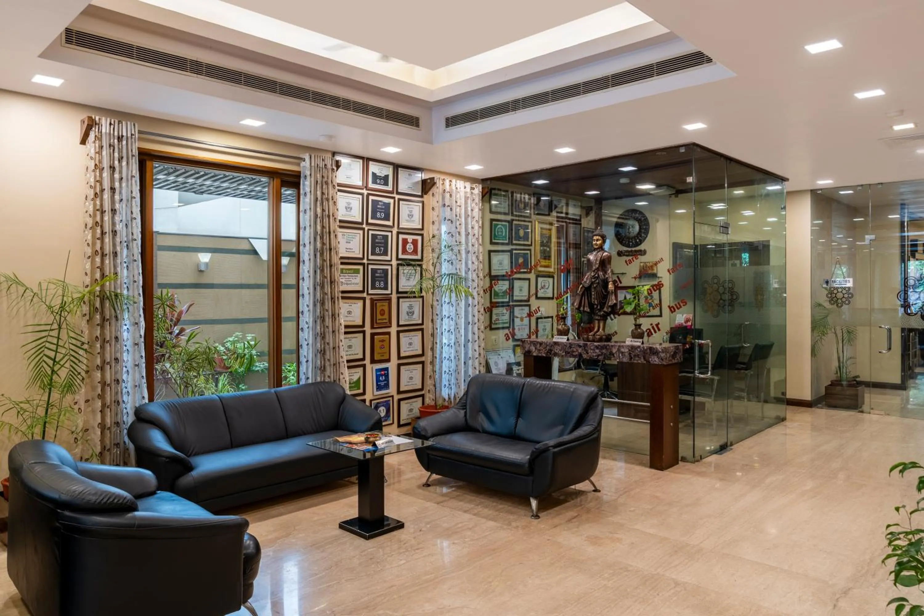 Lobby or reception in Amantra Comfort Hotel