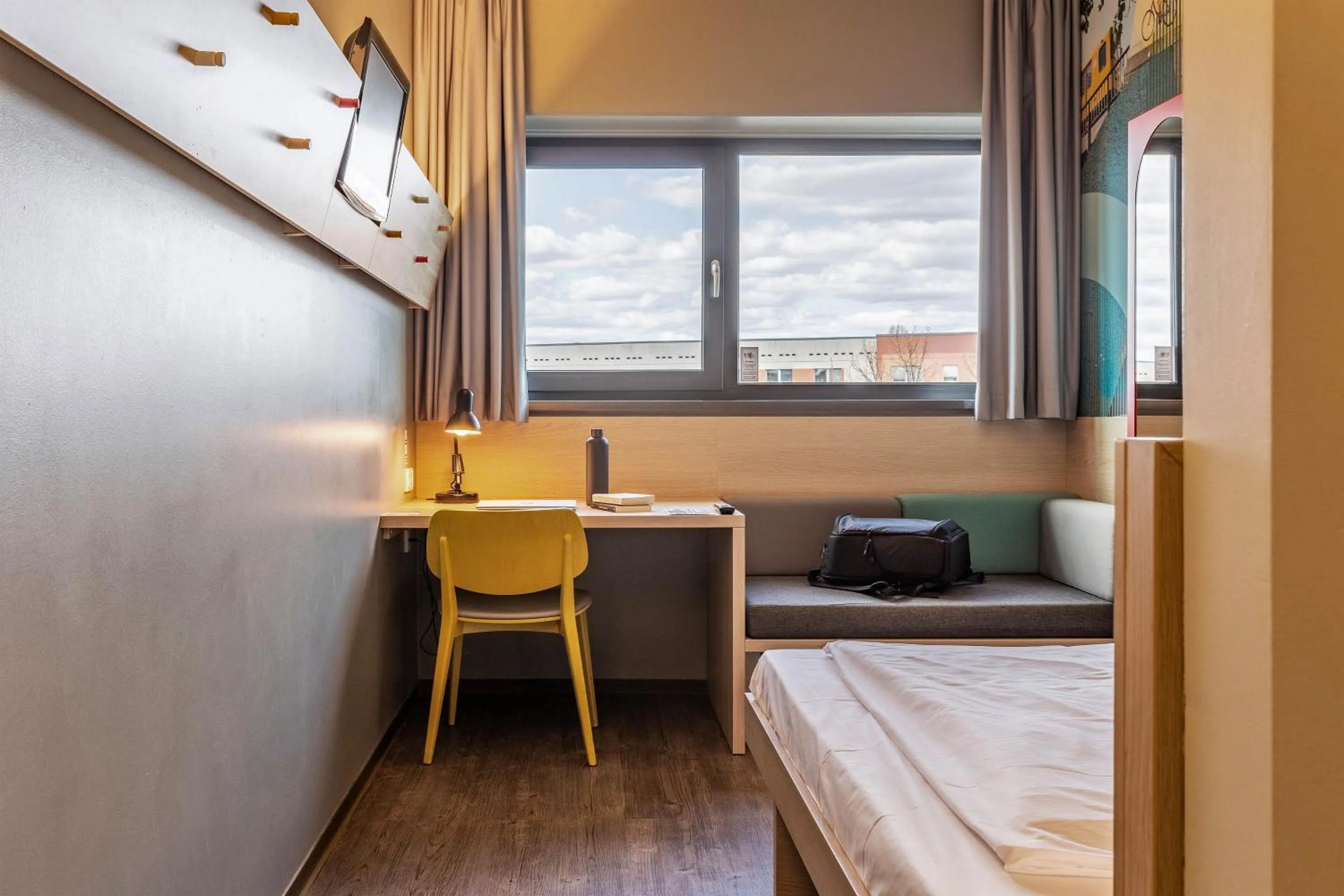 Bedroom, Bed in MEININGER Hotel Berlin Airport