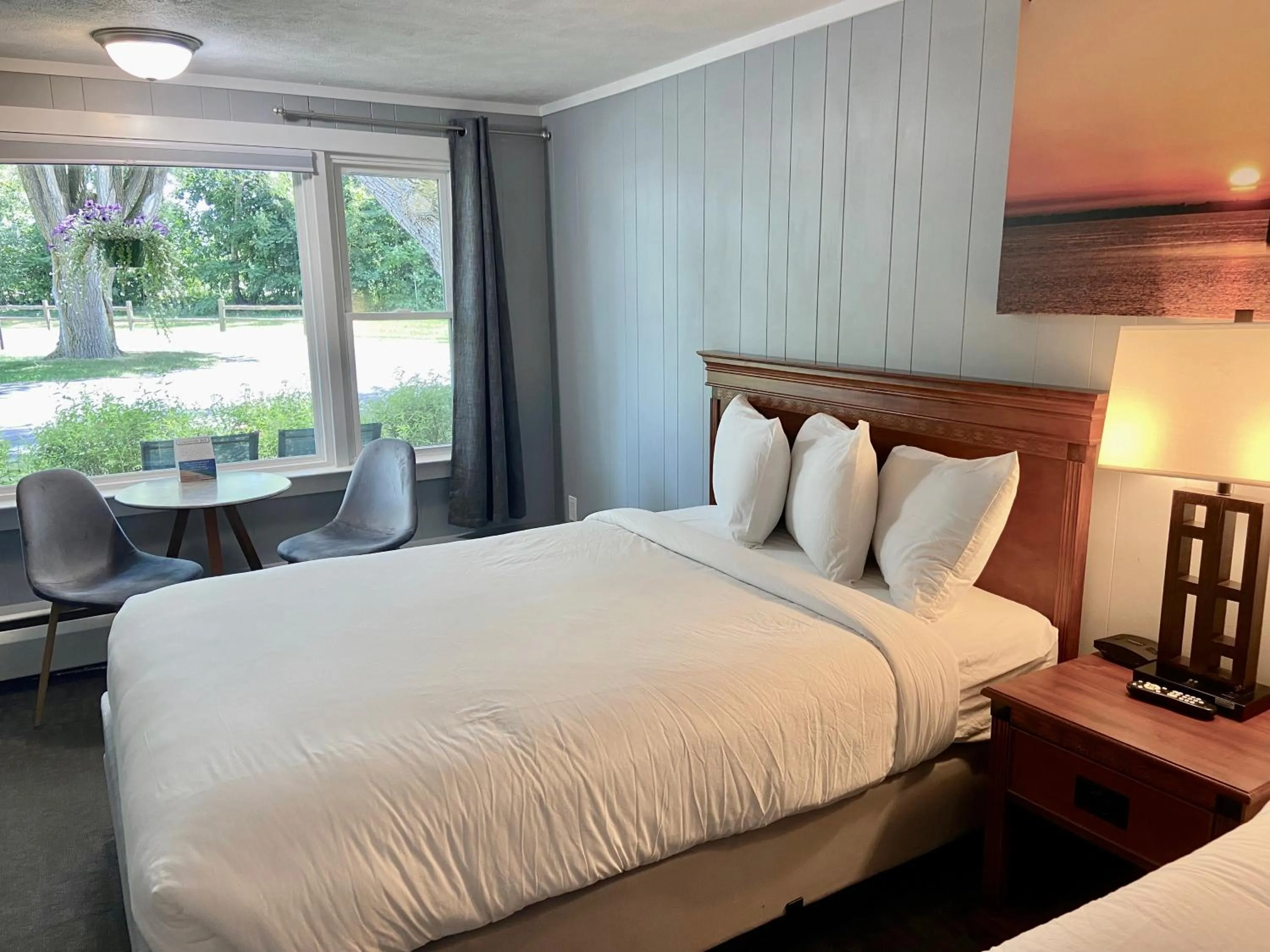 Bed in Elk Rapids Lakeshore Inn