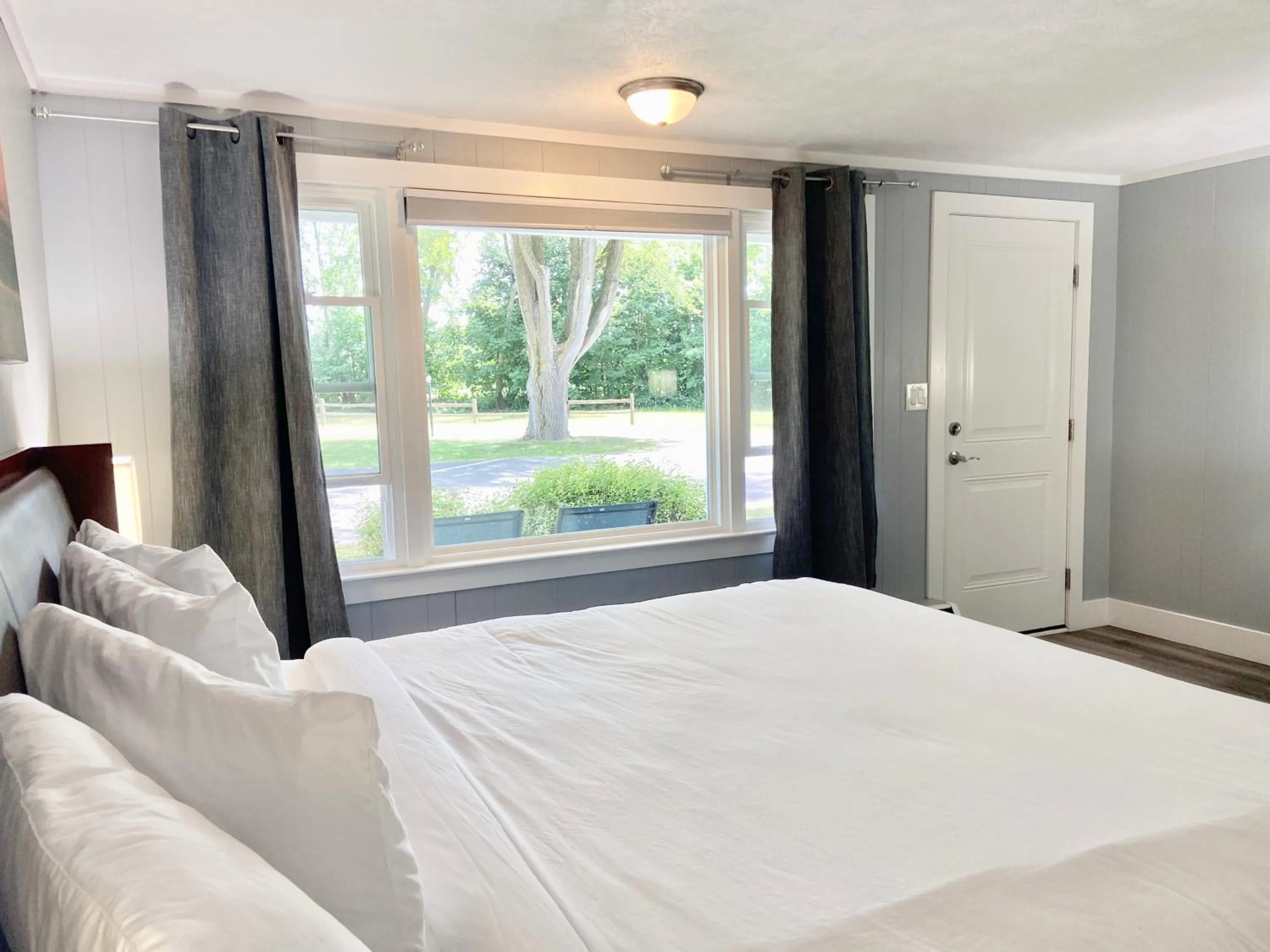 Bed in Elk Rapids Lakeshore Inn