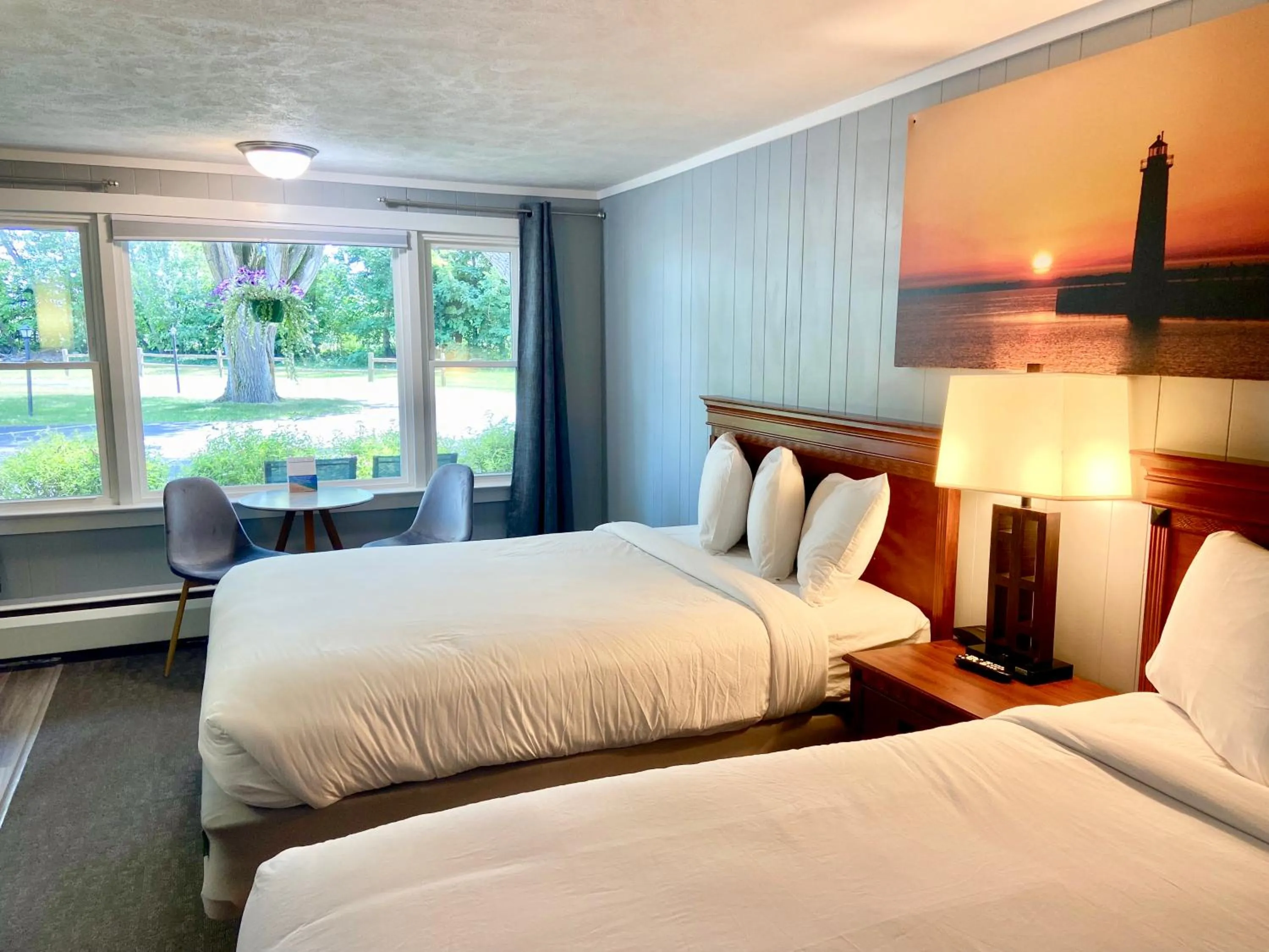 Bed in Elk Rapids Lakeshore Inn