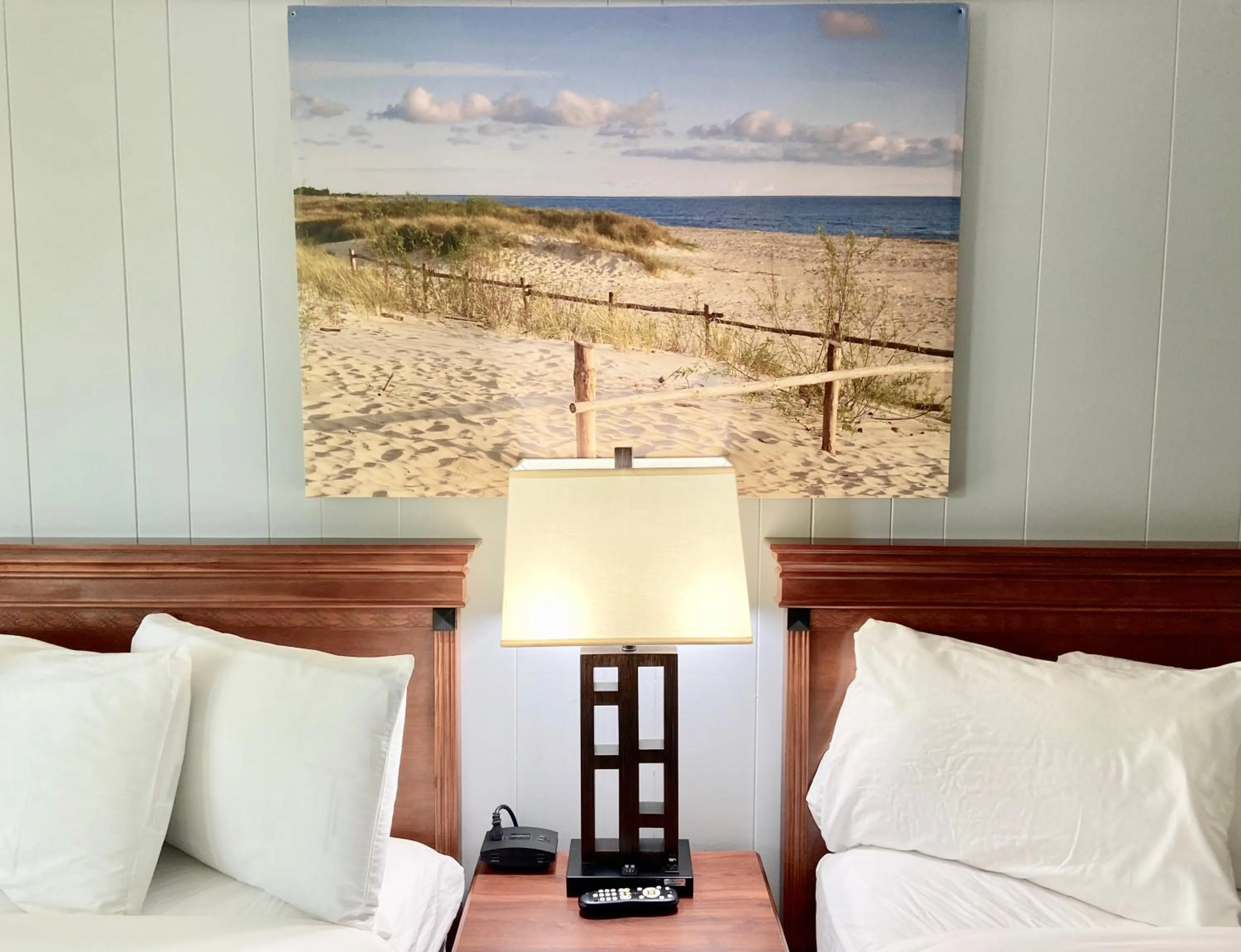 Bed in Elk Rapids Lakeshore Inn