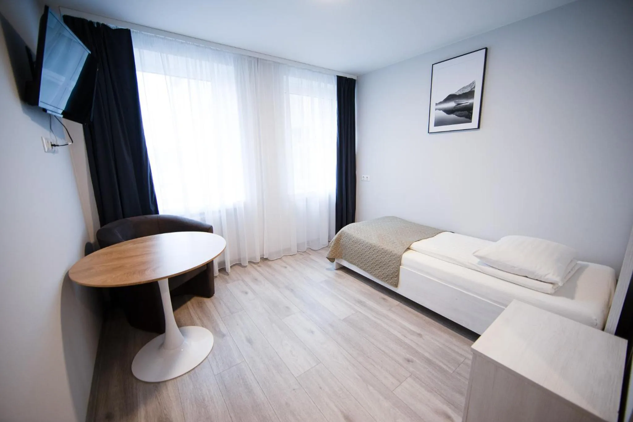 Bed in Dzukija Hotel