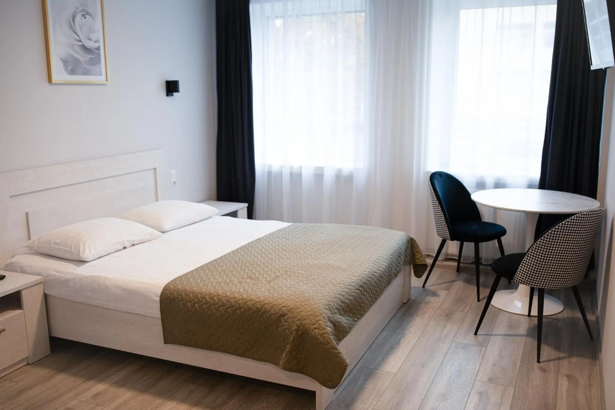 Bed in Dzukija Hotel