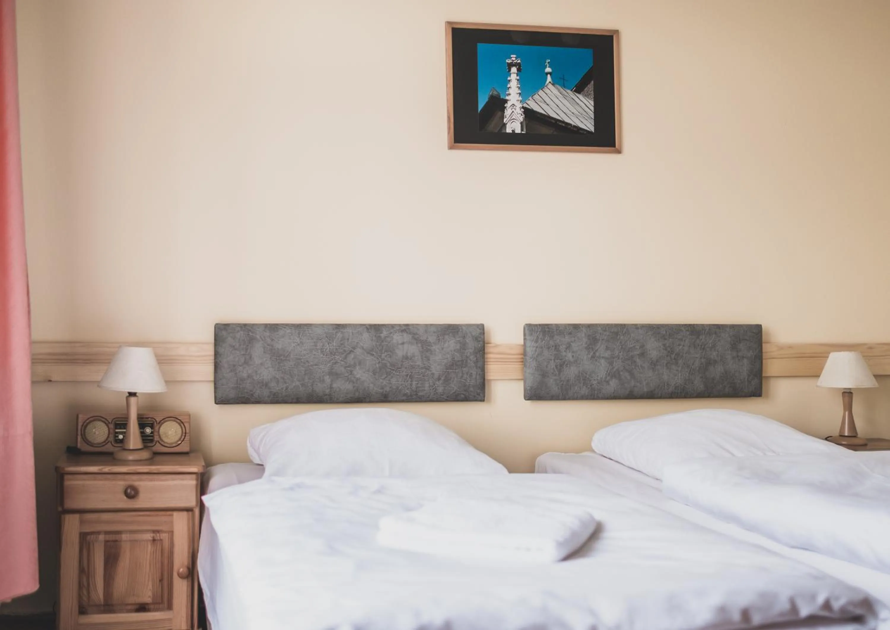 Bed in Cybulskiego Guest Rooms