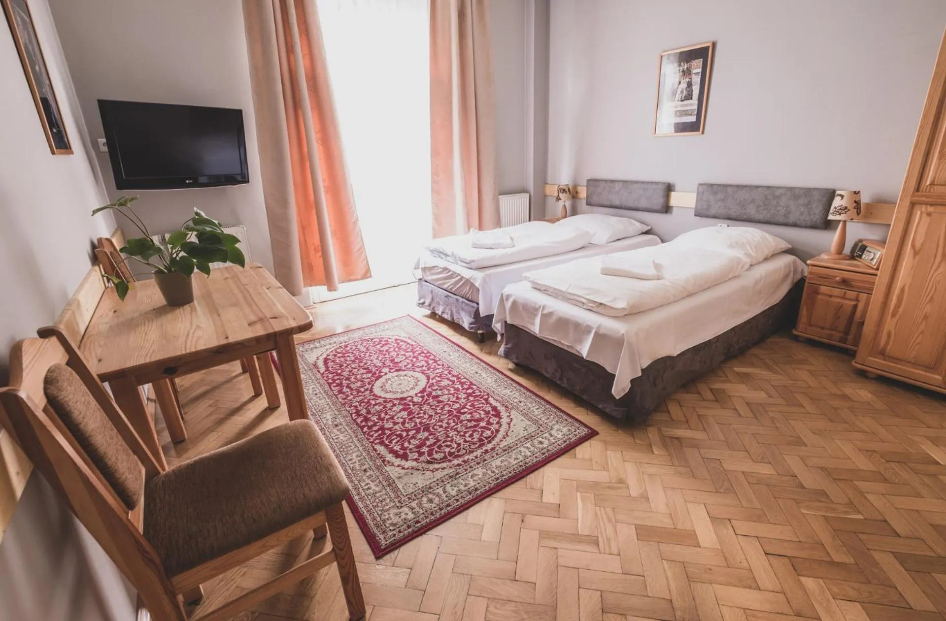 Bed in Cybulskiego Guest Rooms