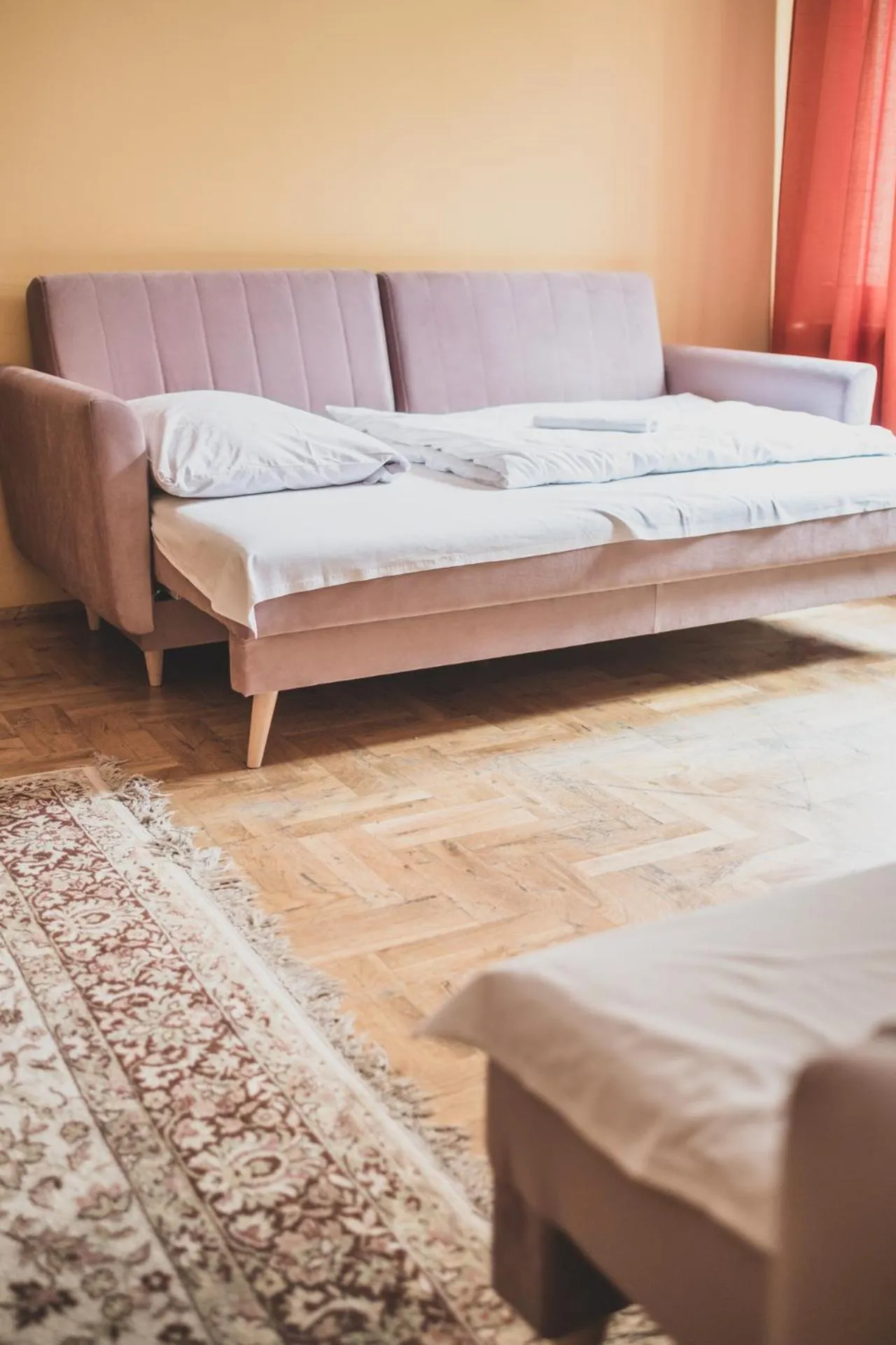 Bed in Cybulskiego Guest Rooms