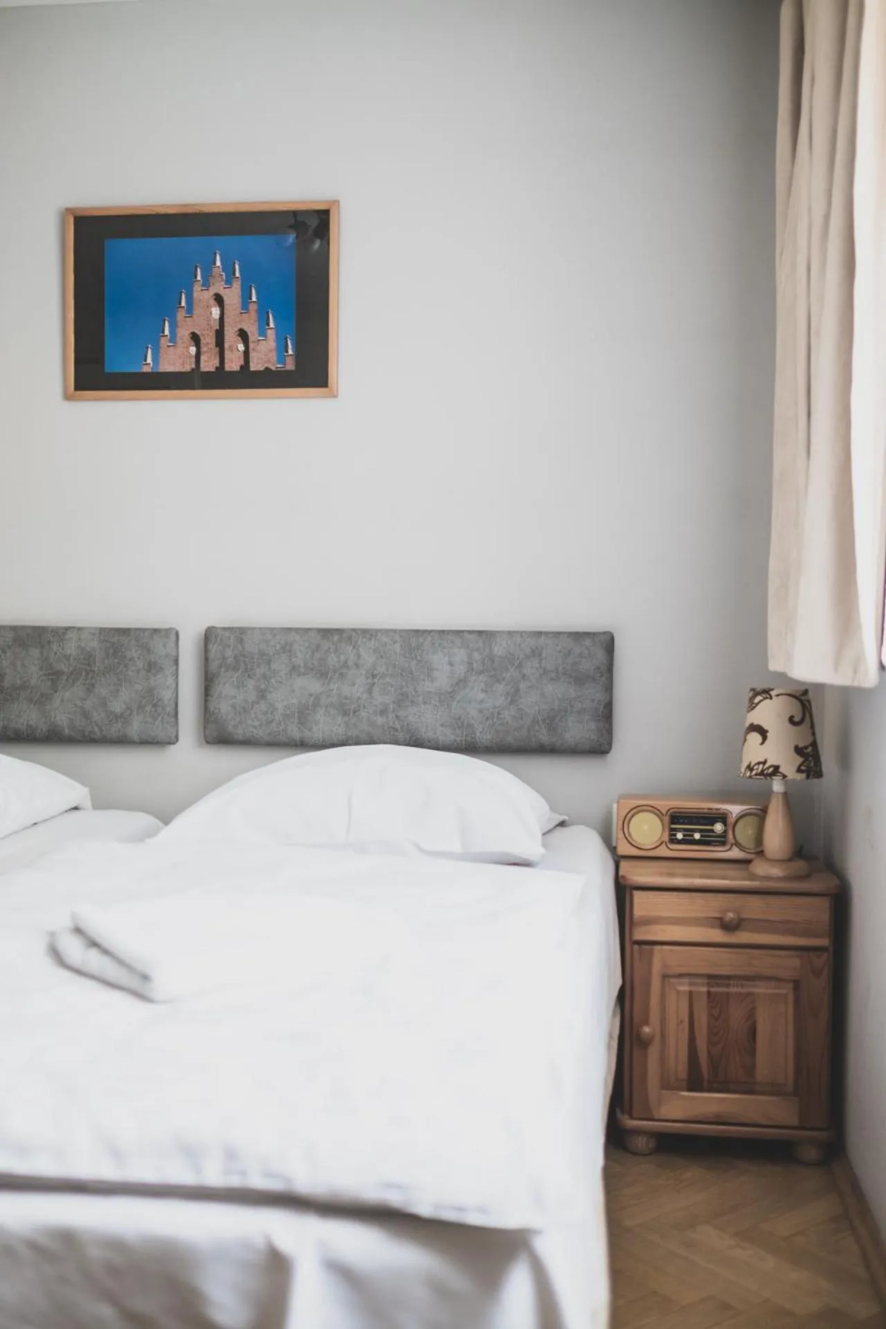 Bed in Cybulskiego Guest Rooms