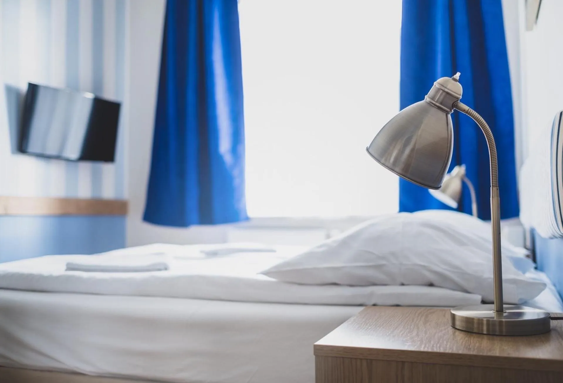 Bed in Cybulskiego Guest Rooms