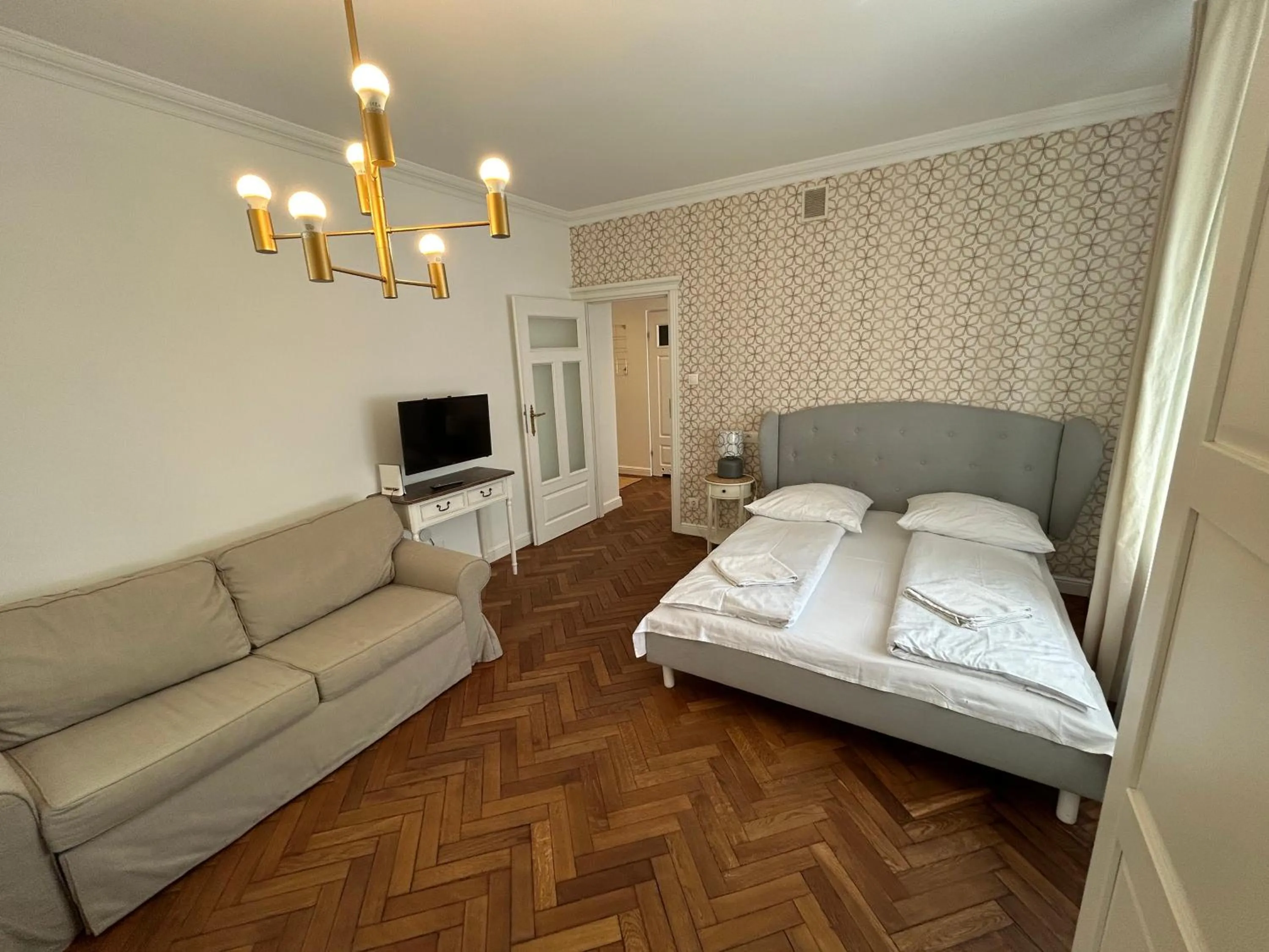 Bed in Cybulskiego Guest Rooms