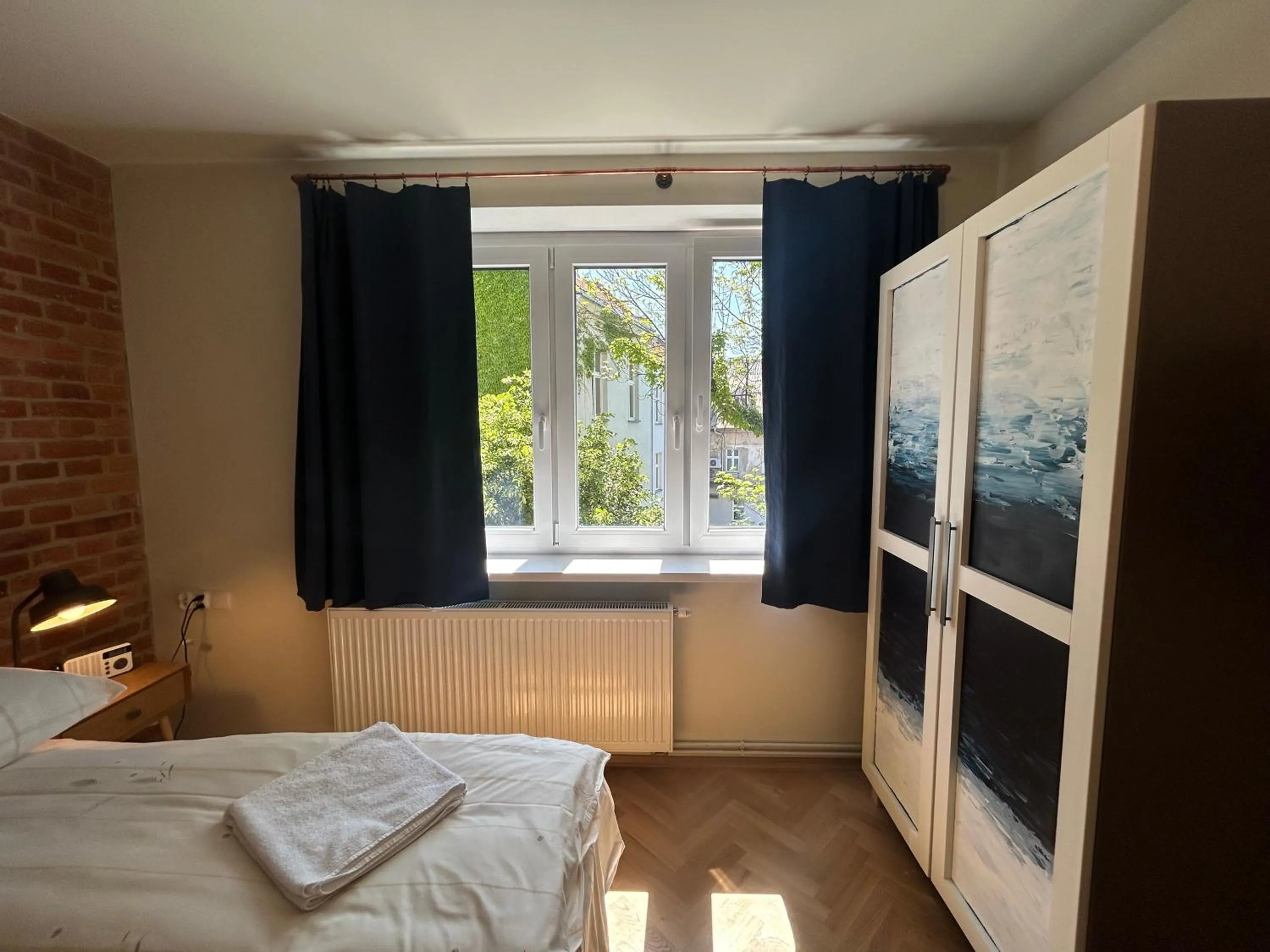 Bed in Cybulskiego Guest Rooms