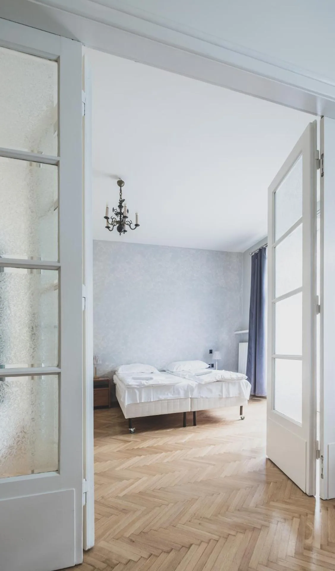 Bed in Cybulskiego Guest Rooms