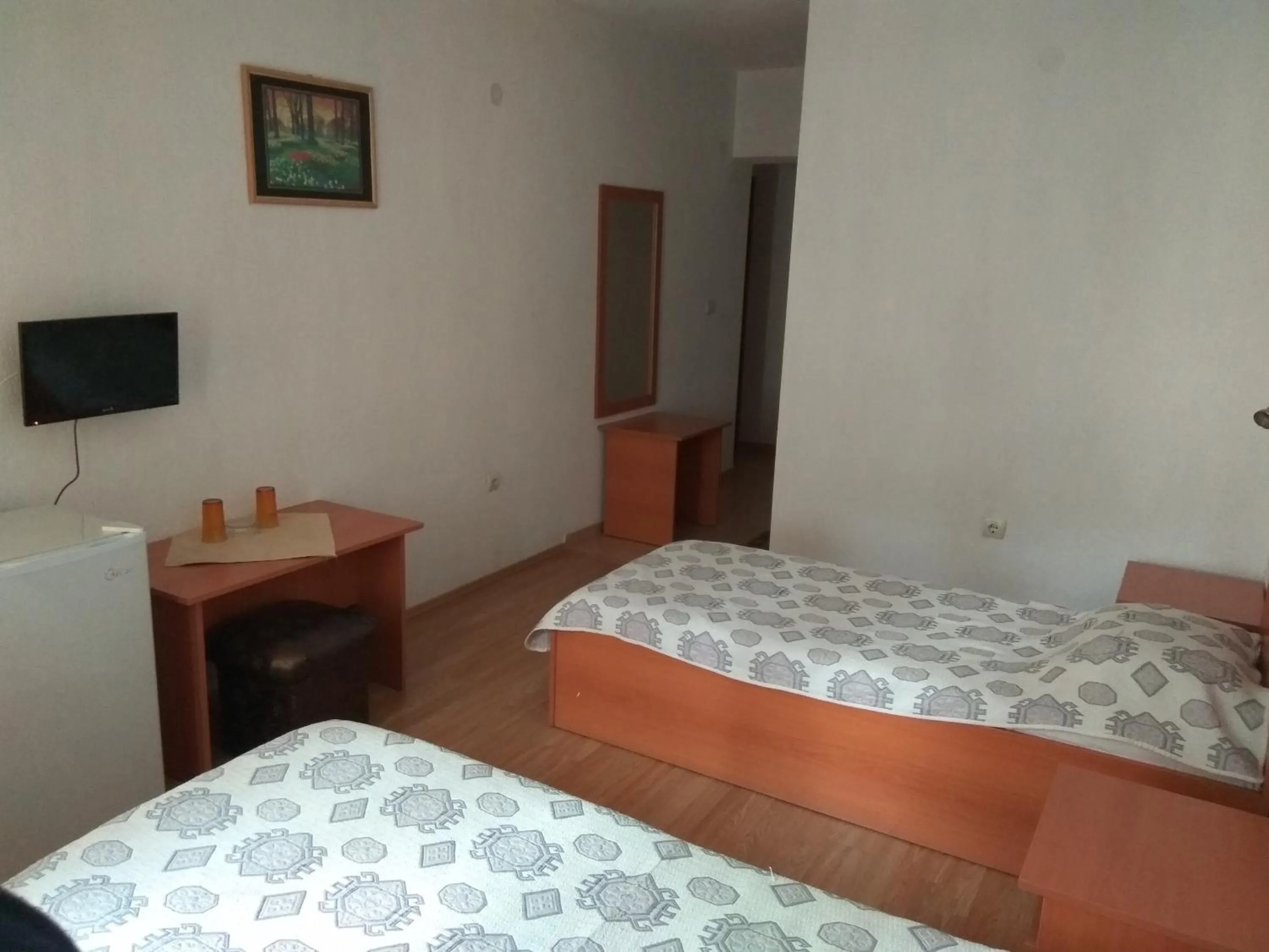 Bed in Family Hotel Blazhi
