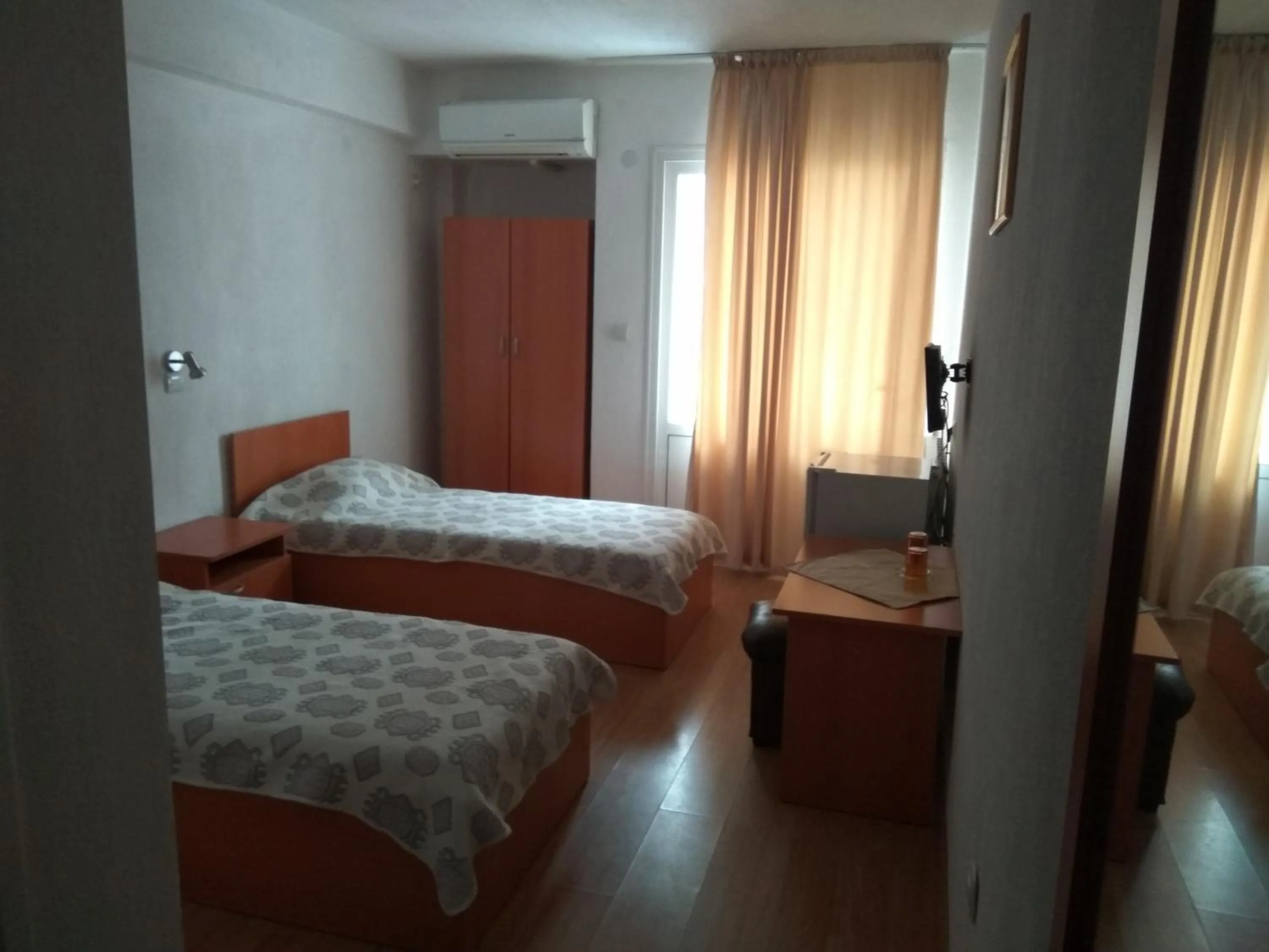Bed in Family Hotel Blazhi