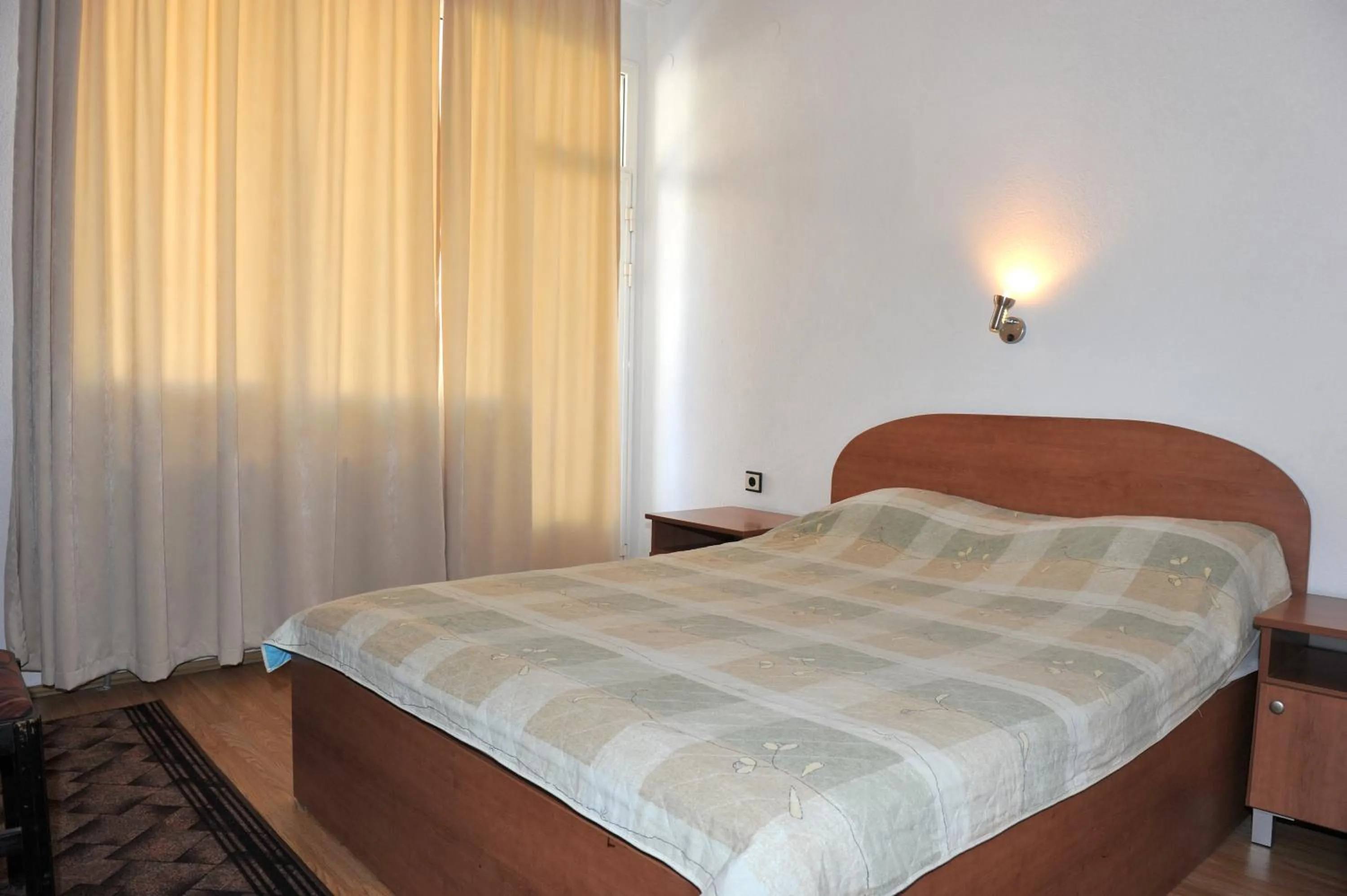 Bed in Family Hotel Blazhi