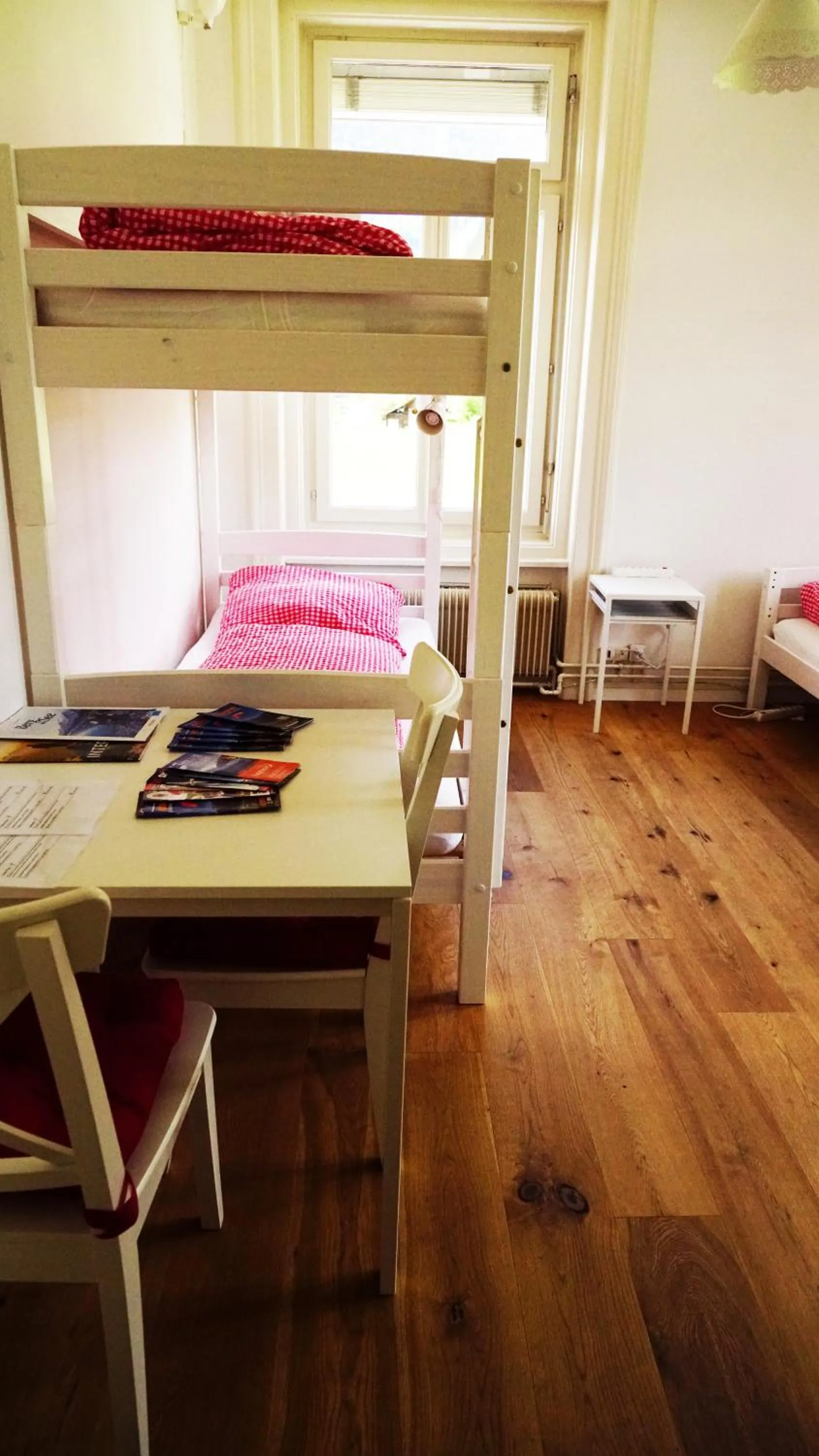 Seating area, Bed in Adventure Hostel Interlaken