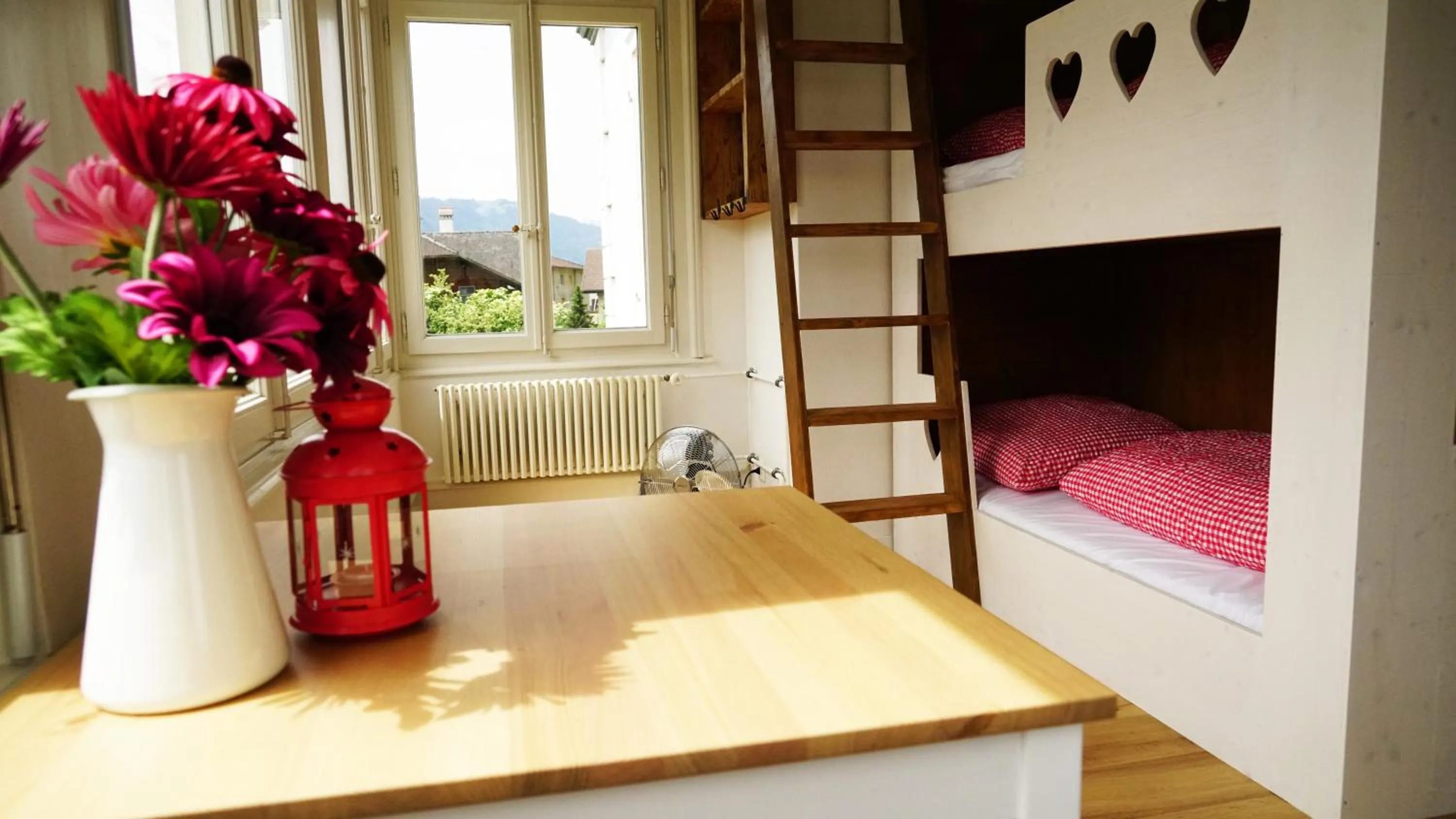 Seating area, Bed in Adventure Hostel Interlaken