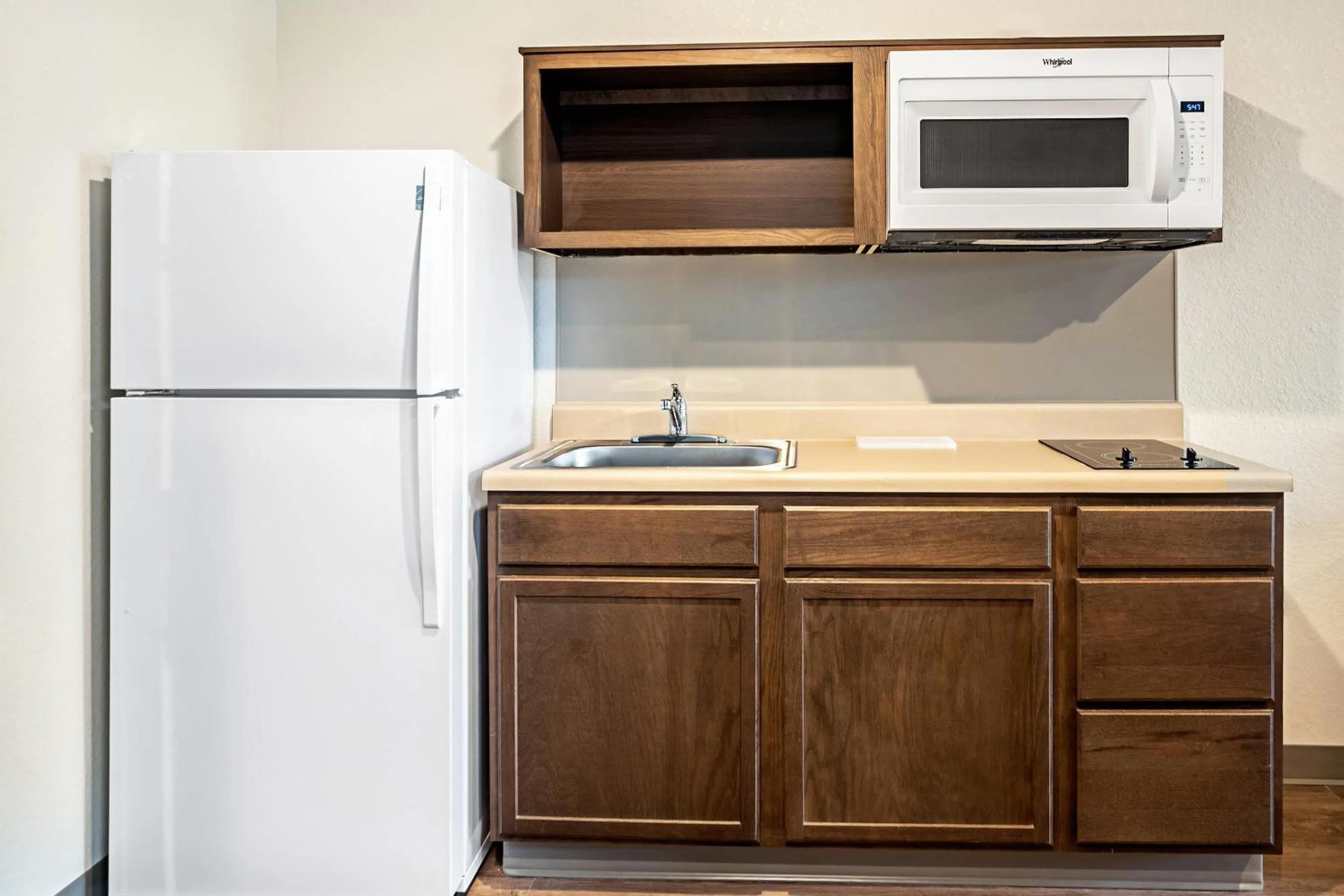 Bedroom in WoodSpring Suites Naples