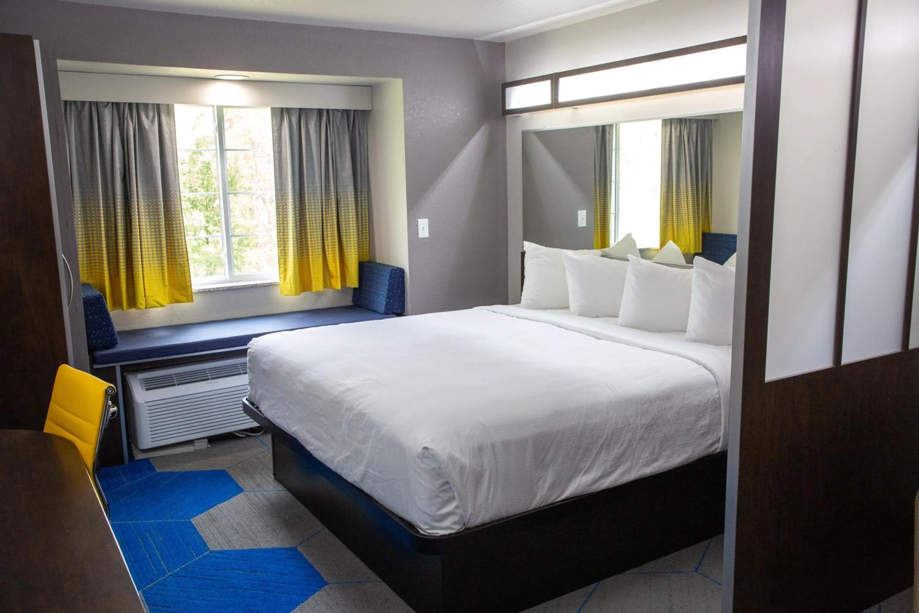 Bed in Microtel Inn & Suites by Wyndham Searcy