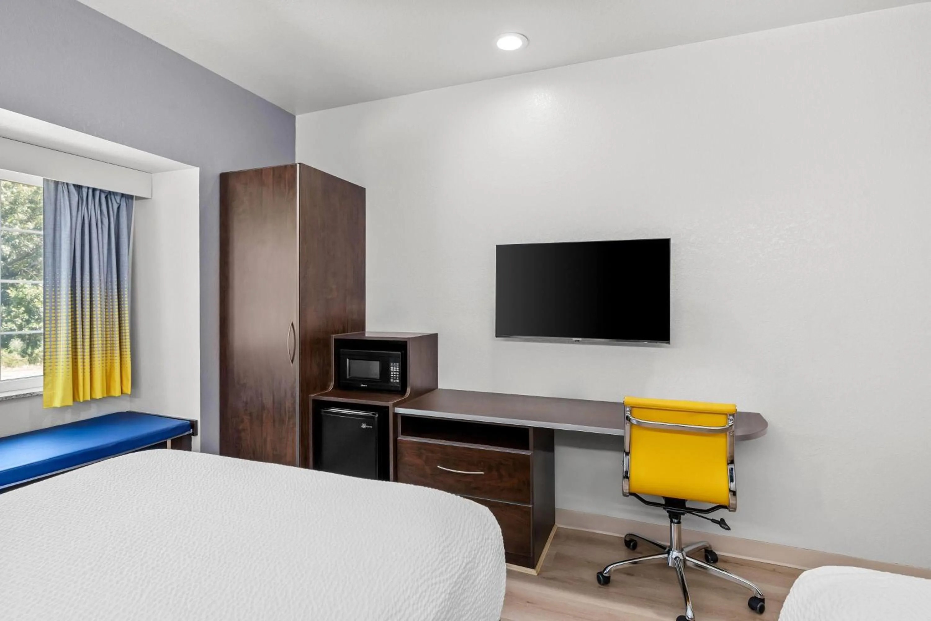 Bed in Microtel Inn & Suites by Wyndham Searcy