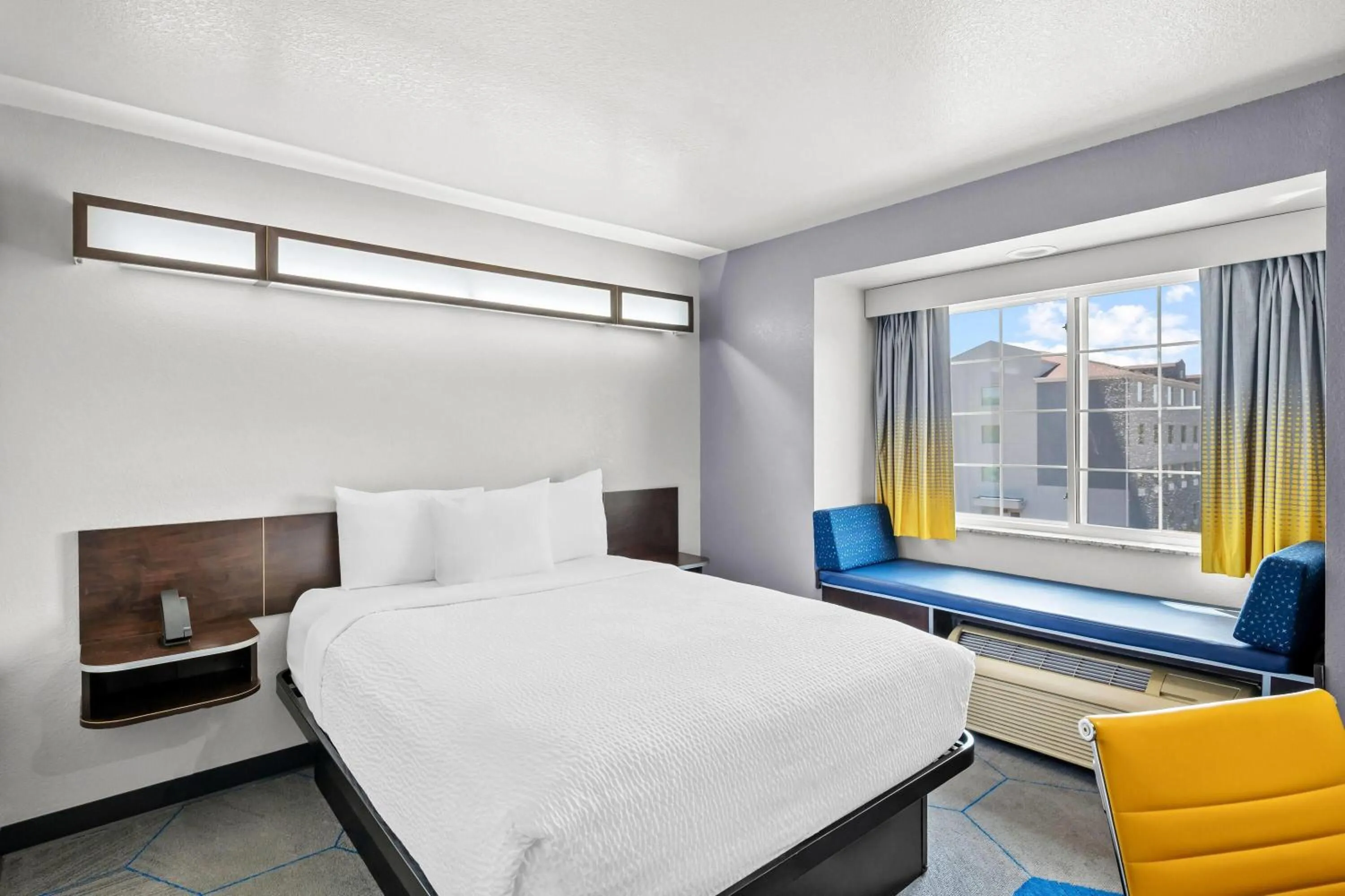 Bed in Microtel Inn & Suites by Wyndham Searcy