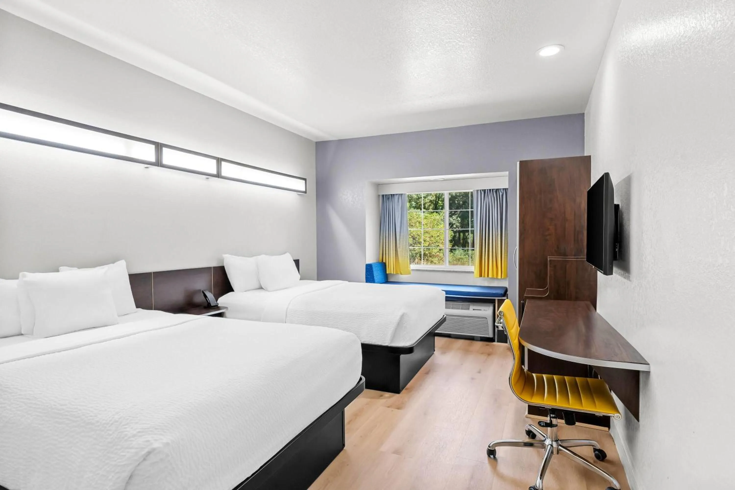 Bed in Microtel Inn & Suites by Wyndham Searcy