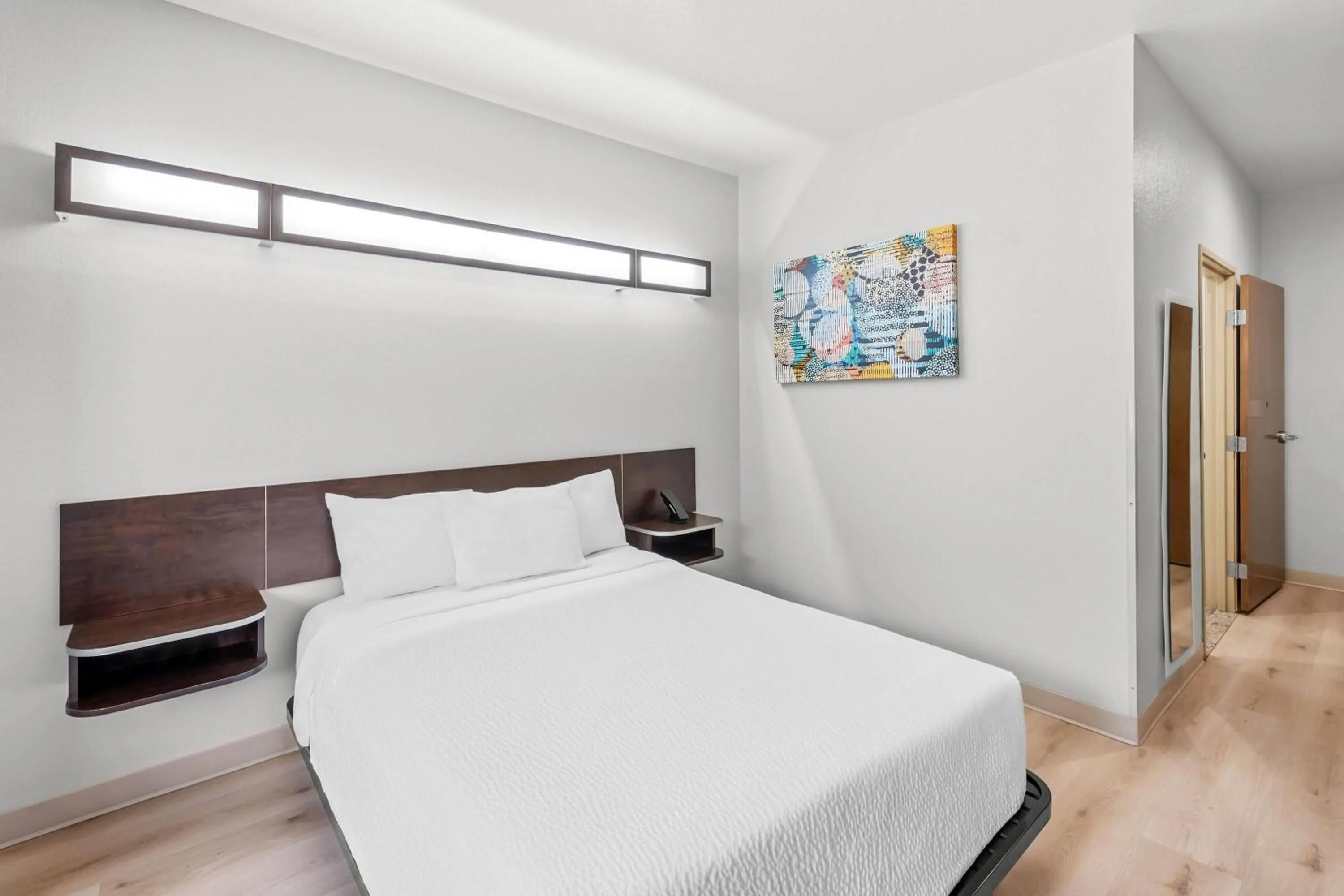 Bed in Microtel Inn & Suites by Wyndham Searcy