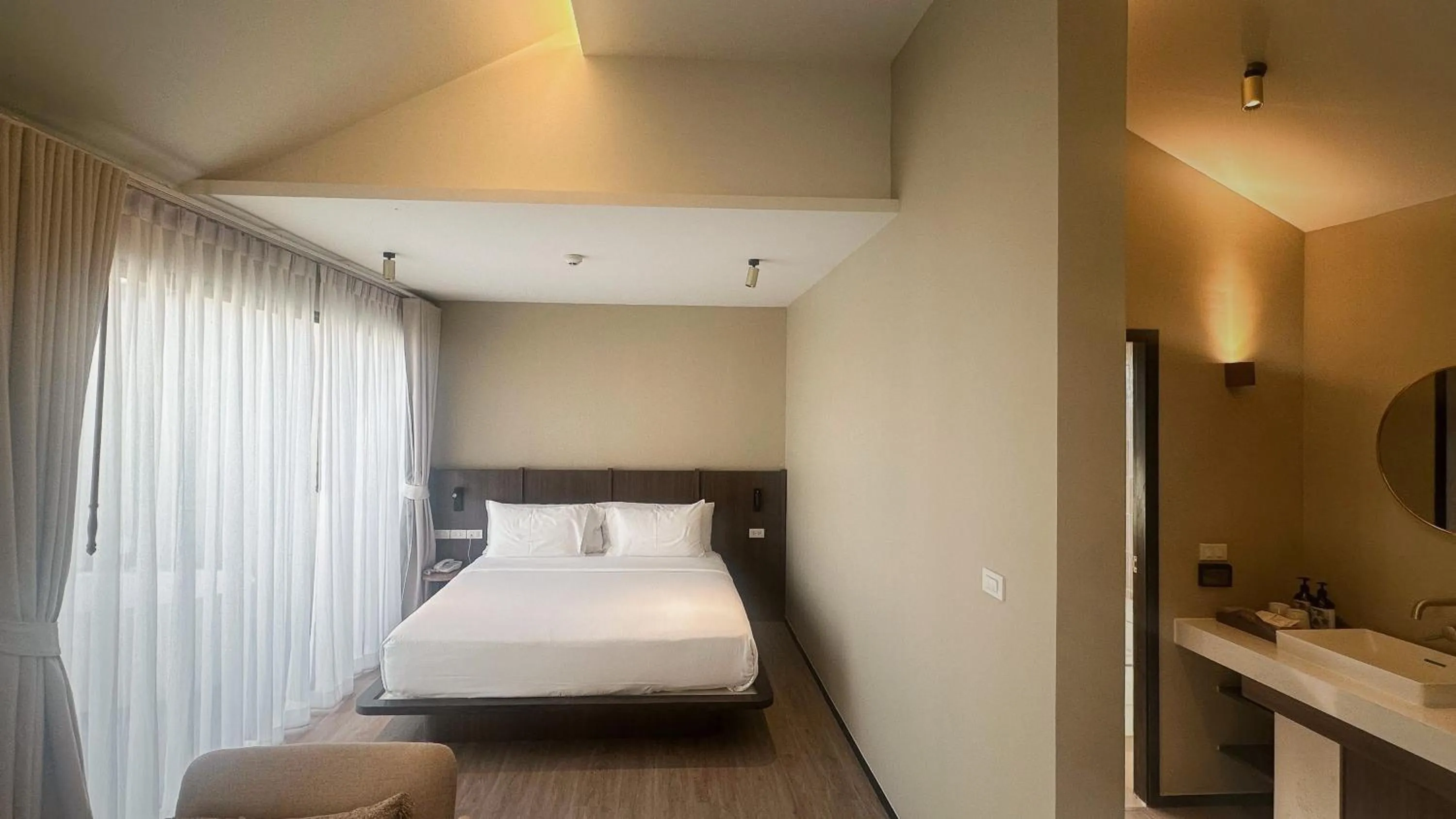 Bed in Triple Tree Beach Resort