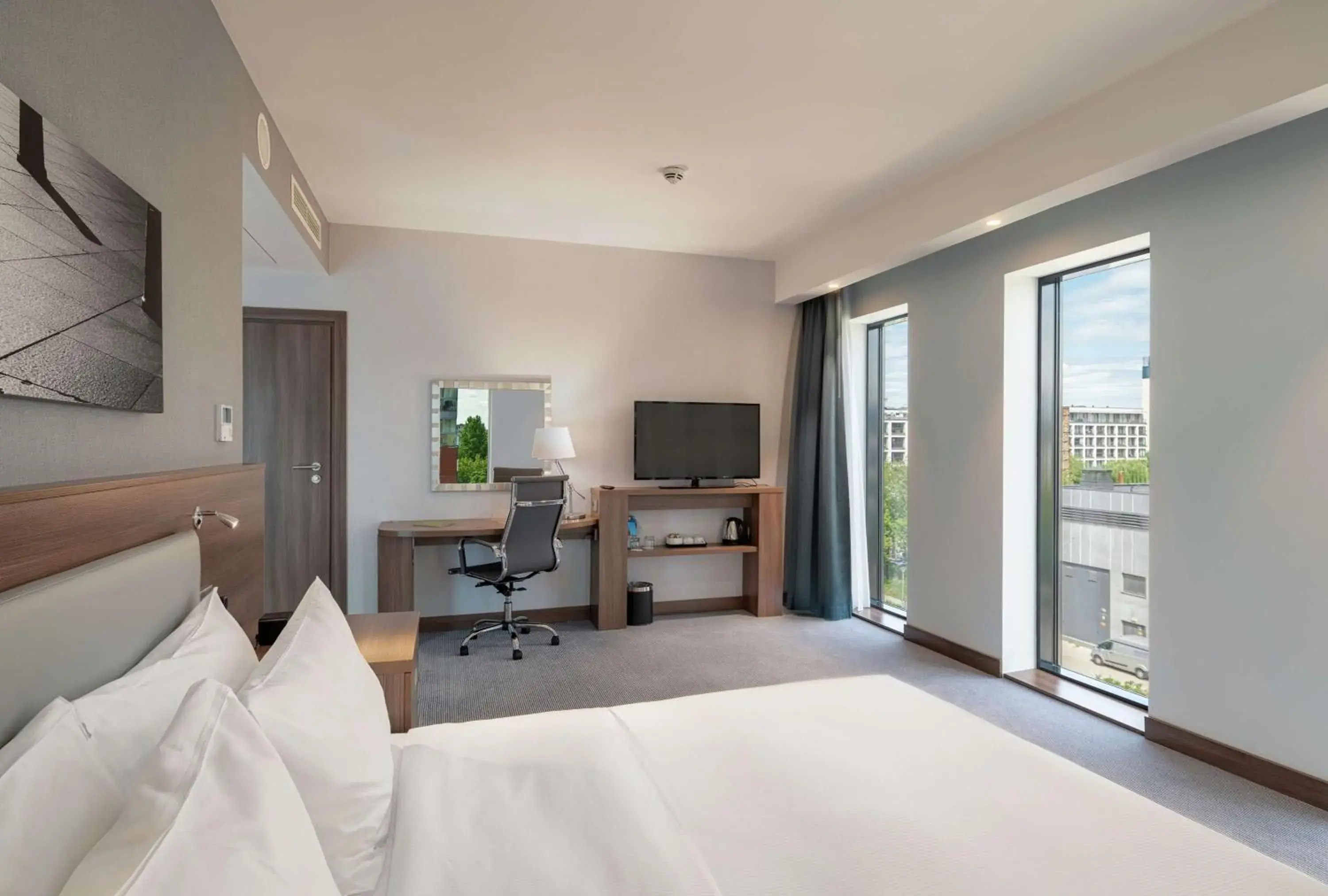 Communal lounge/ TV room, Bed in Hampton By Hilton Warsaw Mokotow Communal lounge/ TV room, Bed in Hampton By Hilton Warsaw Mokotow