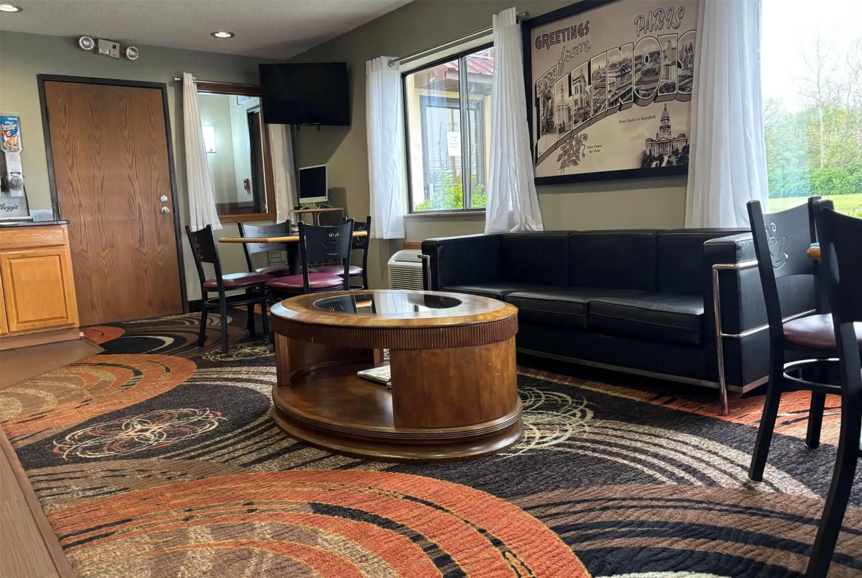 Lobby or reception in Super 8 by Wyndham Paris IL Lobby or reception in Super 8 by Wyndham Paris IL