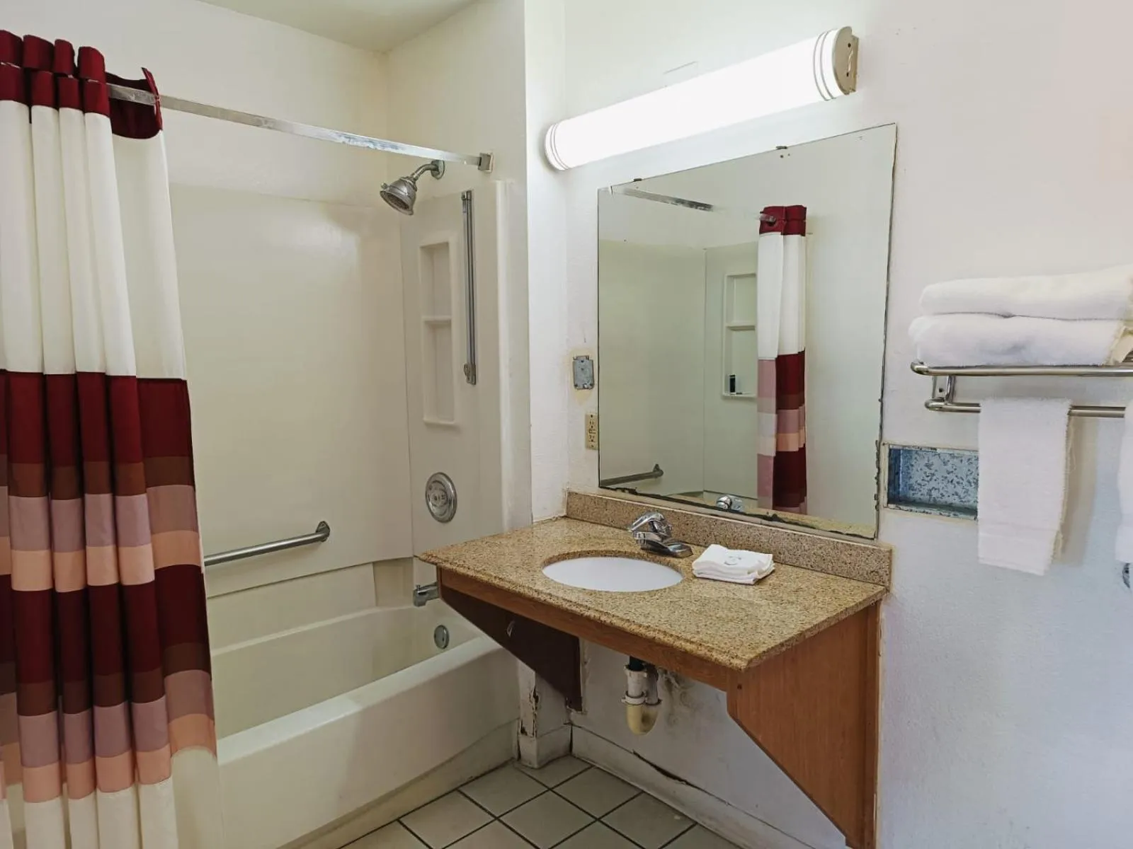 Bathroom in Travelers inn by OYO Wichita Falls