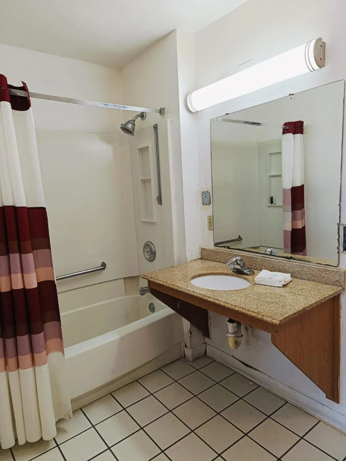 Bathroom in Travelers inn by OYO Wichita Falls